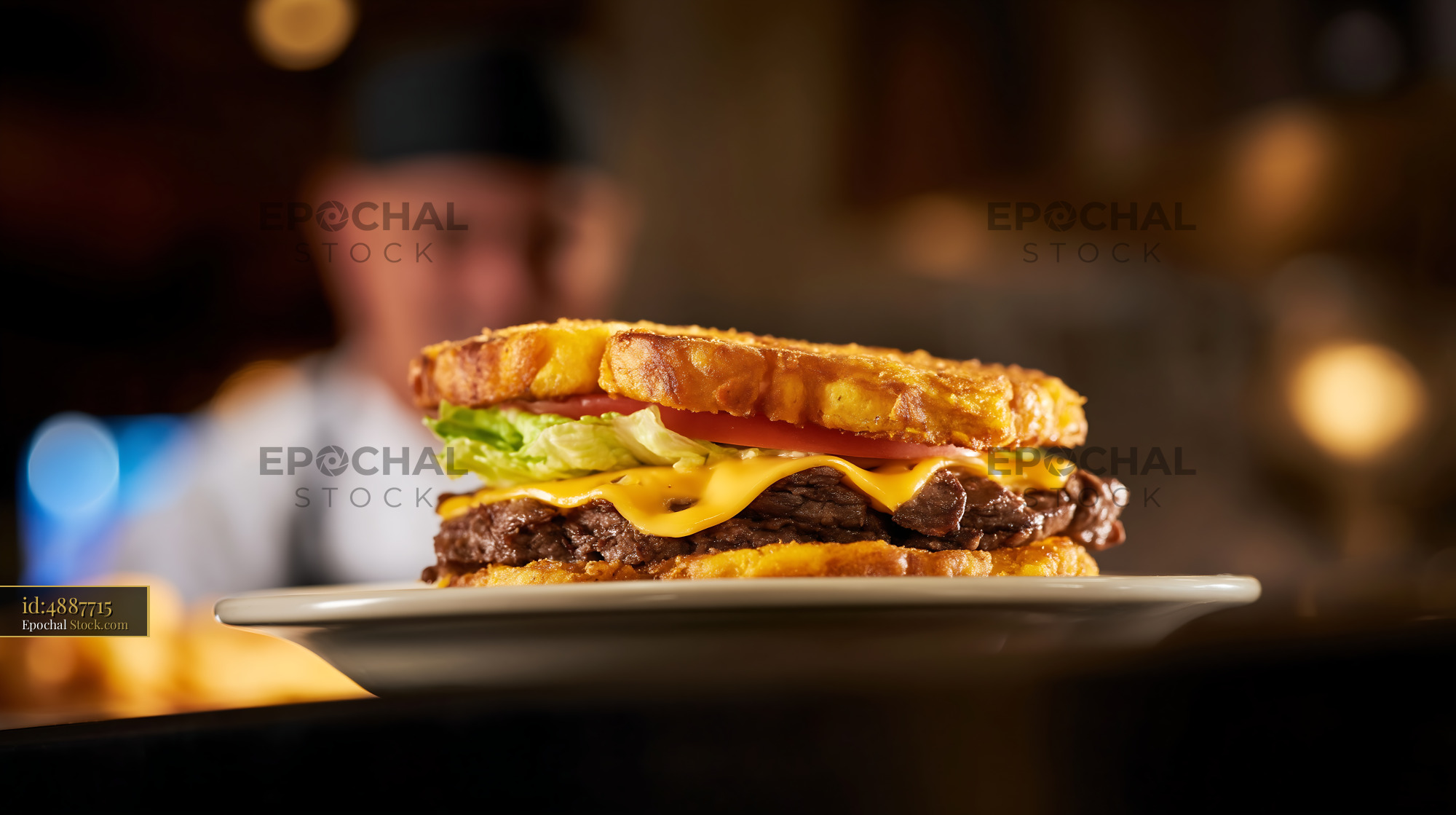 Gourmet Cheeseburger Served on White Plate - stock photo