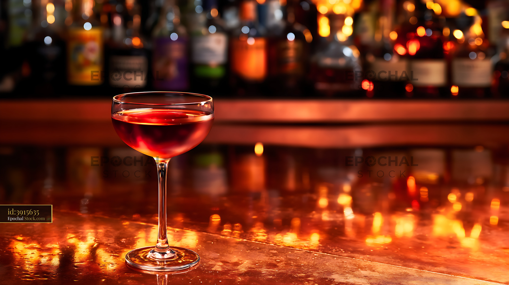 Bushwick Cocktail in Coupe Glass at Bar - stock photo