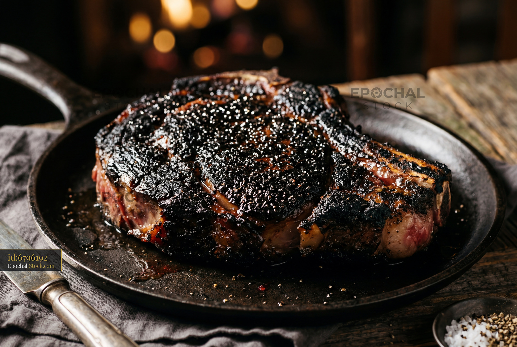 Premium Steak with Sea Salt Crust on Cast Iron - stock photo