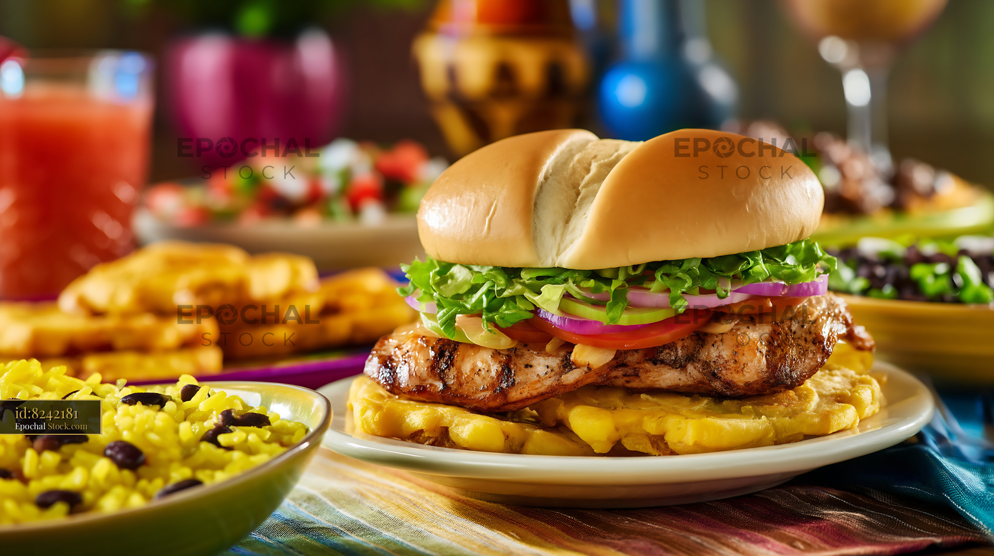 Cheeseburger with Fries on Vibrant Outdoor Table - stock photo
