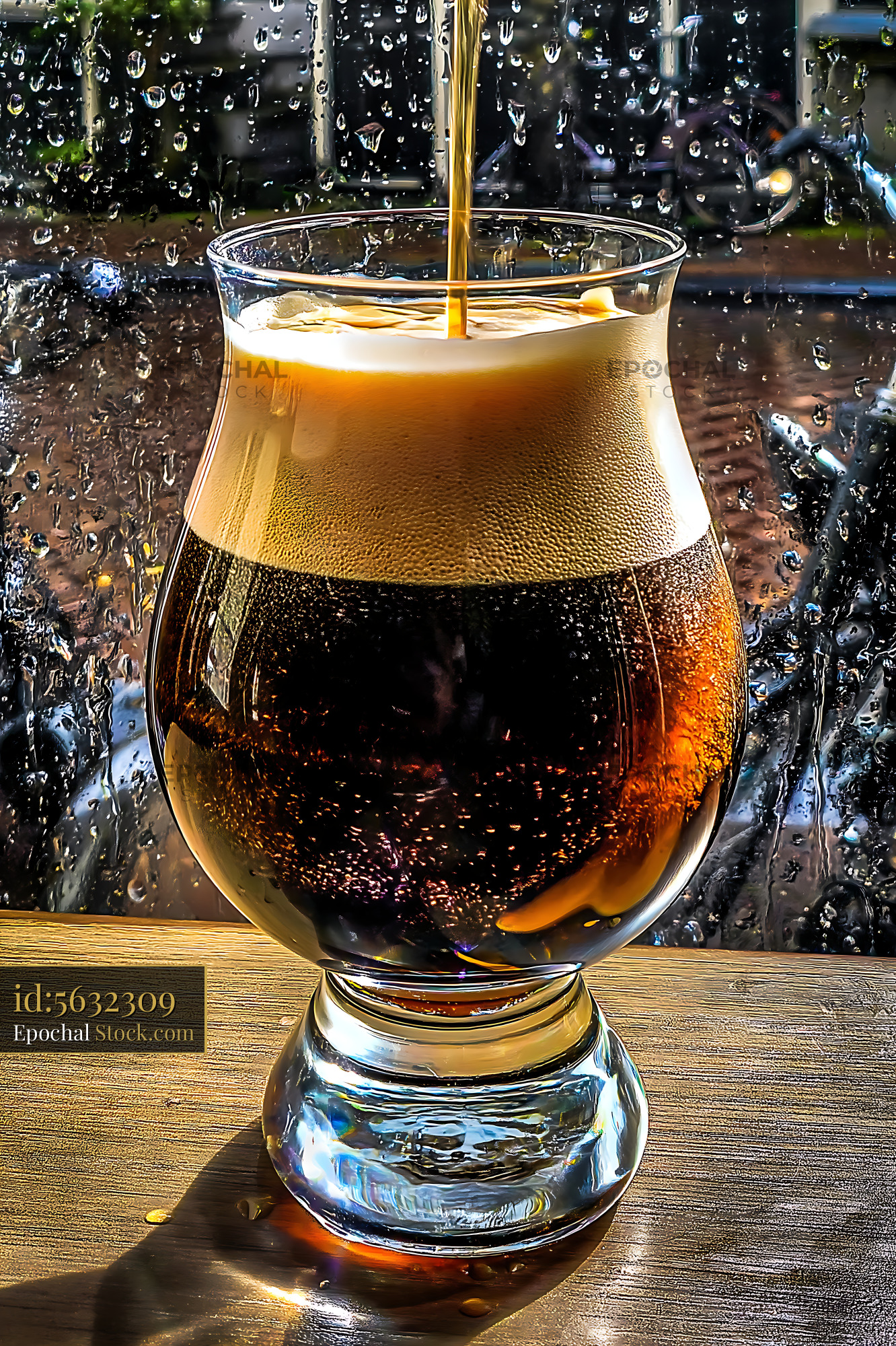 Nitro Caramel Coffee Poured Over Ice - stock photo