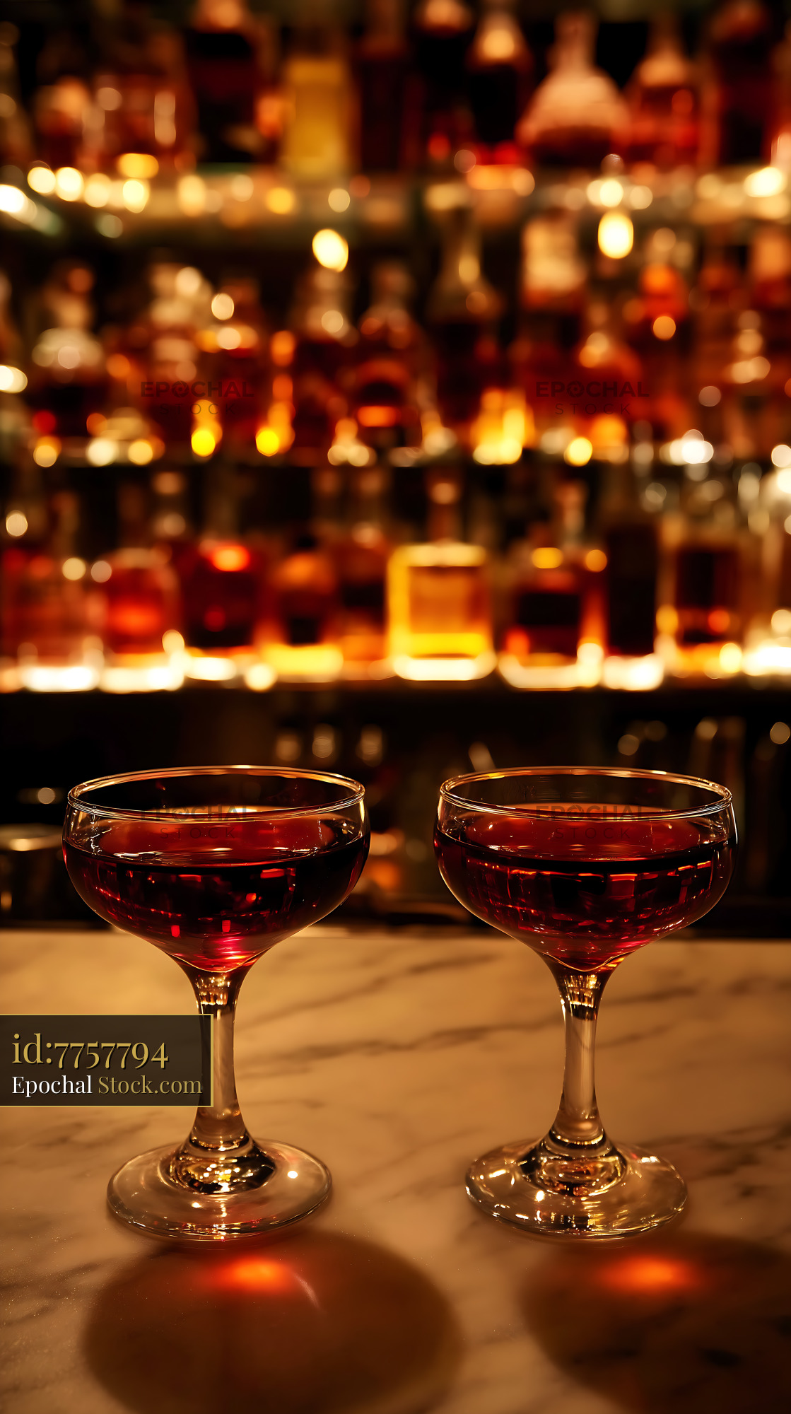 Bushwick Cocktail Pair on Marble Bar Counter - stock photo