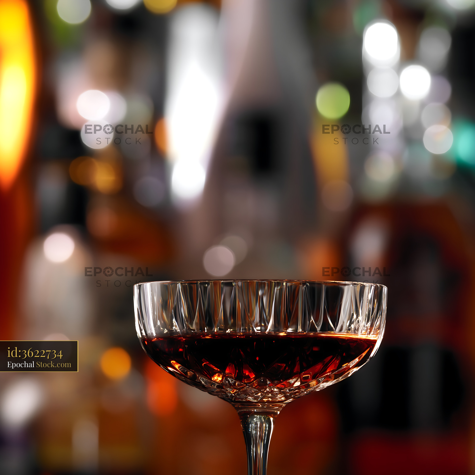 Bushwick Cocktail in Coupe Glass at Bar - stock photo