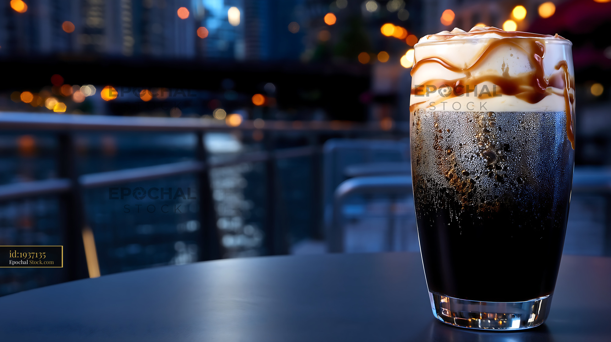 Iced Nitro Caramel Coffee Against City Lights - stock photo