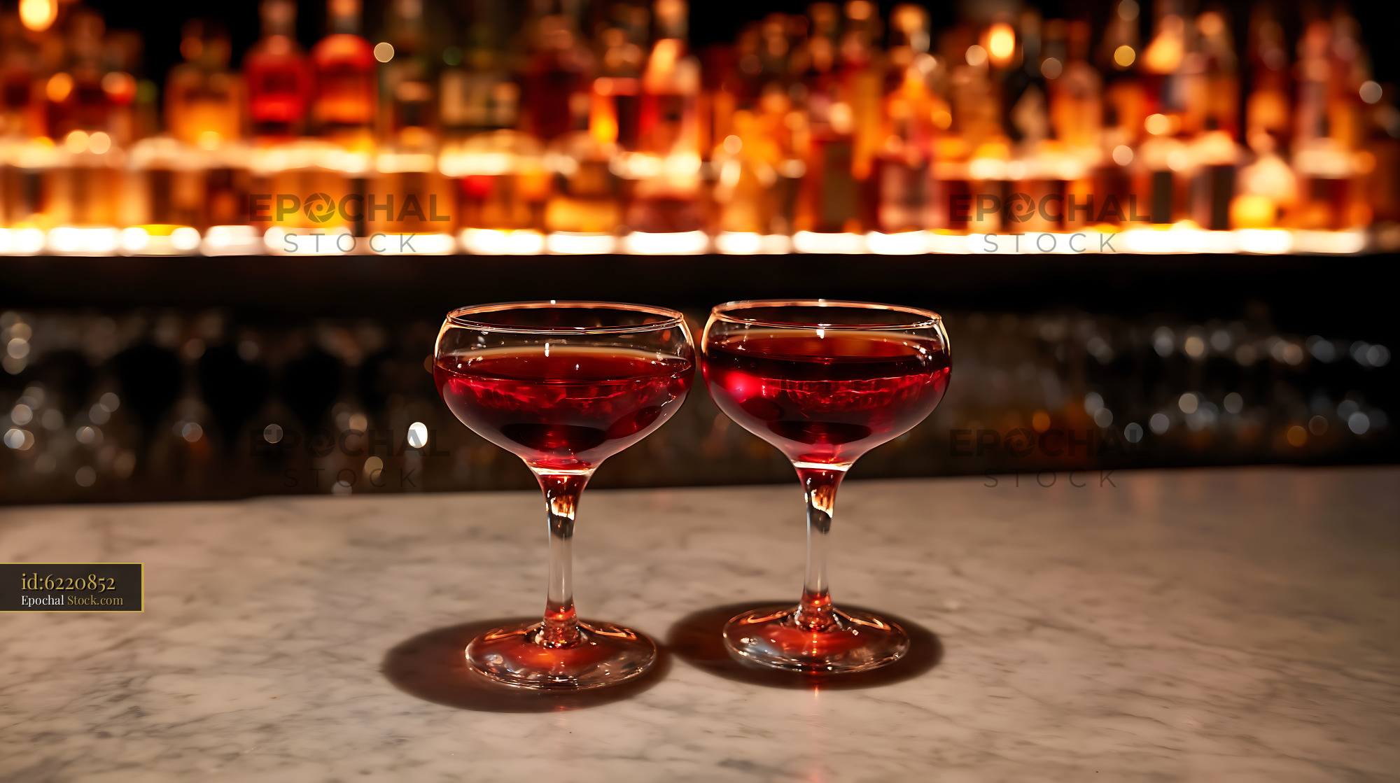 Bushwick Cocktails Served in Coupe Glasses at Bar - stock photo