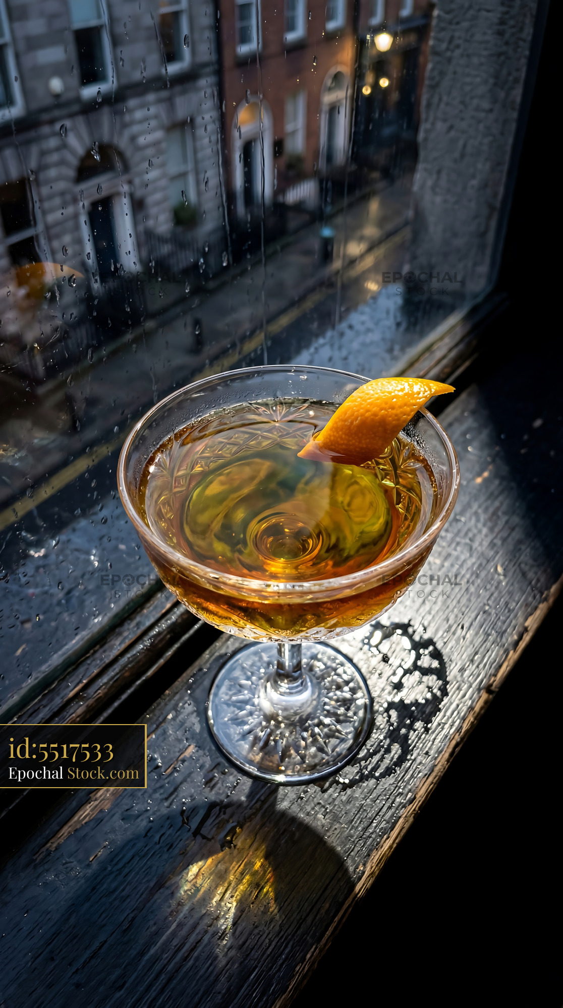 Tipperary Cocktail on Rainy Street Window - stock photo