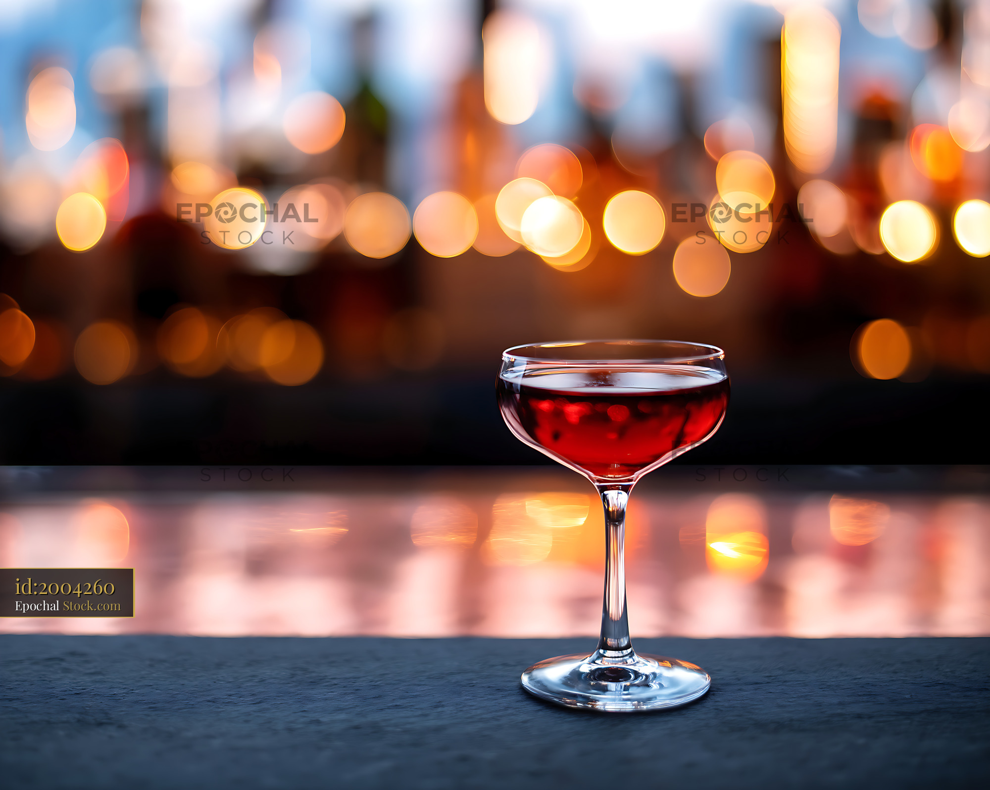 Bushwick Cocktail in Coupe Glass with City Lights - stock photo