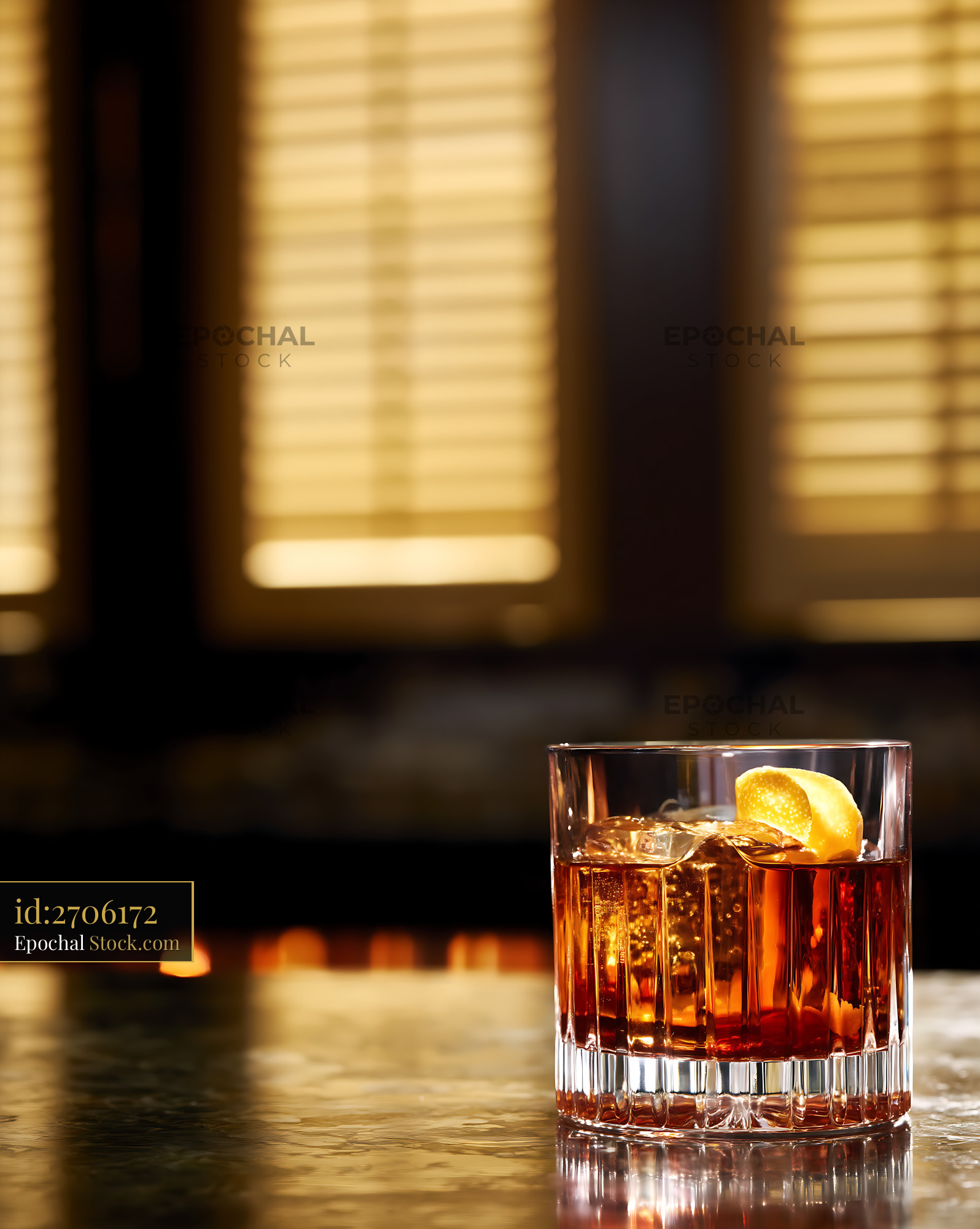 Saratoga Cocktail with Lemon Twist in Bar - stock photo