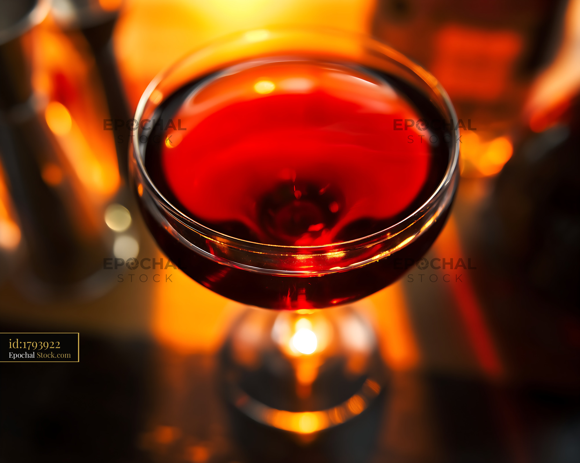 Bushwick Cocktail in Coupe Glass with Warm Bar Lighting - stock photo