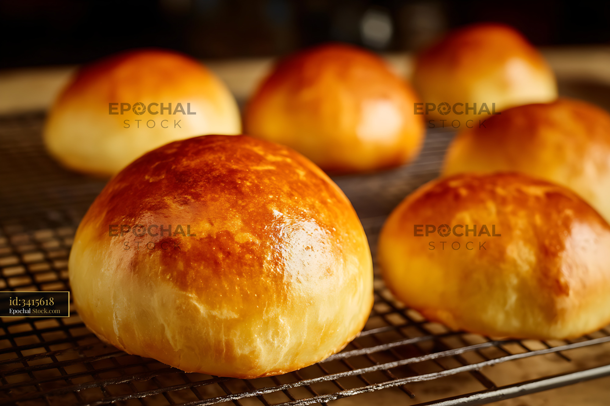 Freshly Baked Bread Rolls Cooling on Wire Rack - stock photo
