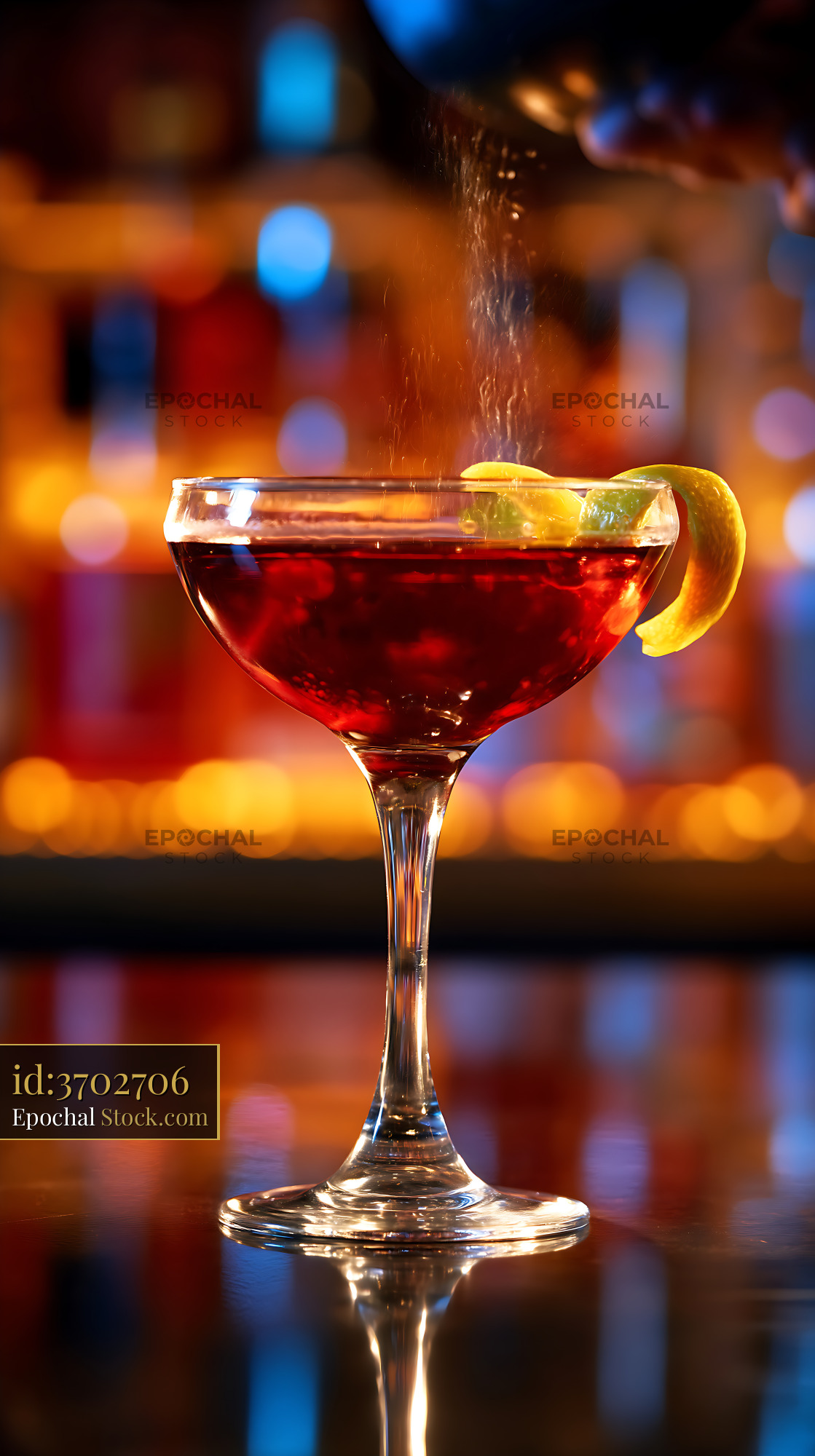 Bushwick Cocktail Poured with Lemon Twist - stock photo