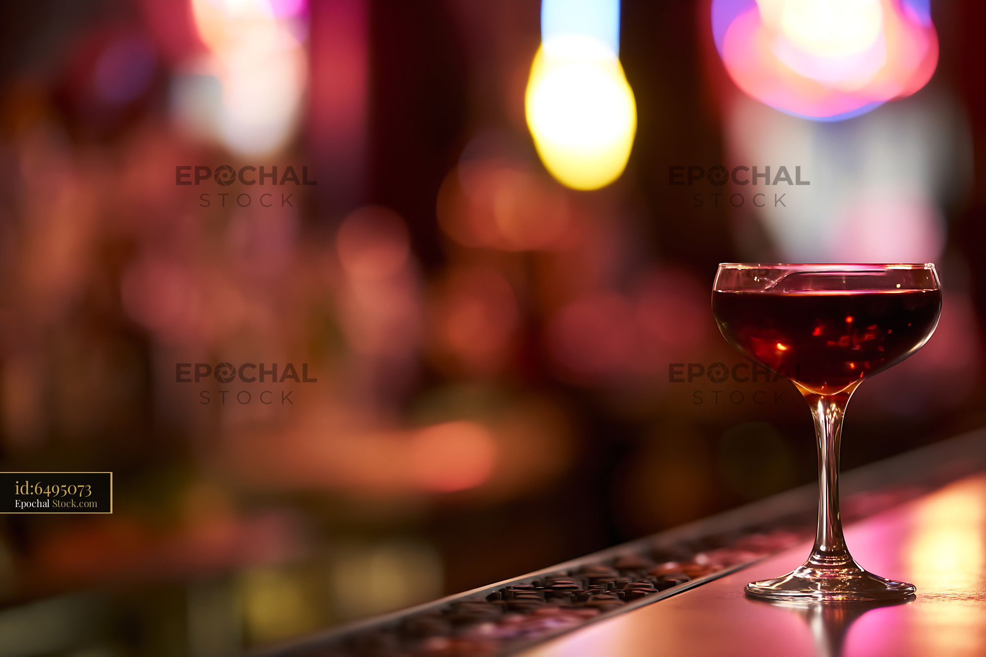 Bushwick Cocktail Served at Bar with Bokeh Lights - stock photo