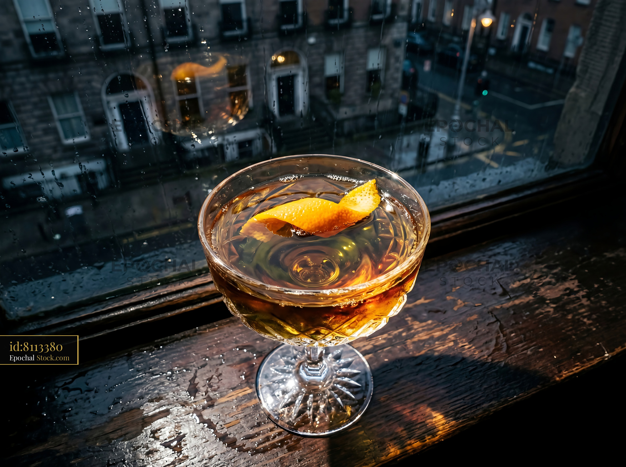 Tipperary Cocktail with Lemon Twist, Rainy Window - stock photo