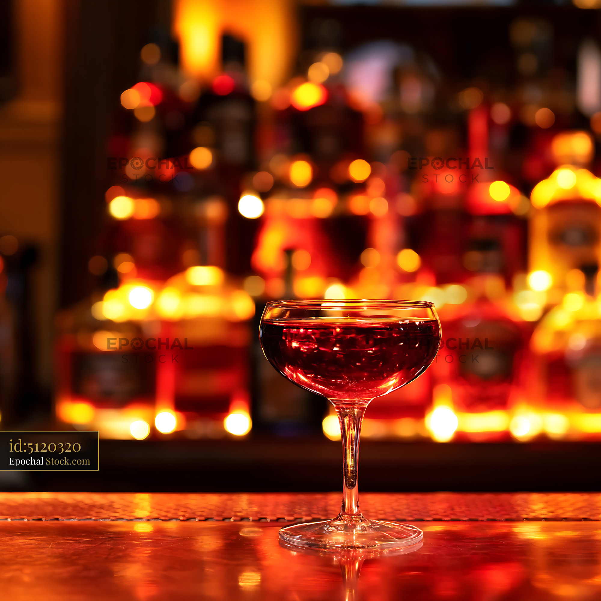 Bushwick Cocktail in Coupe Glass at Bar - stock photo