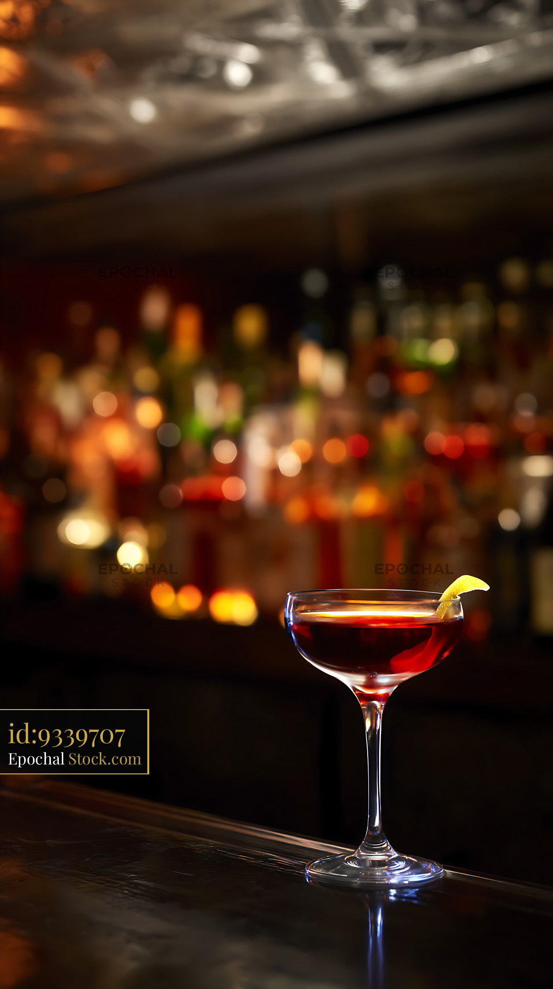 Bushwick Cocktail with Lime Wheel at Bar - stock photo