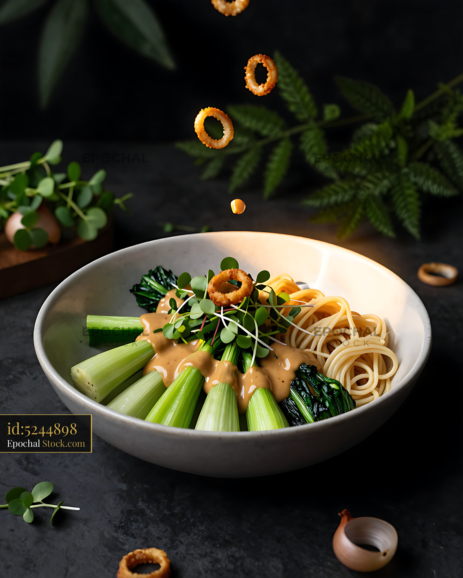 Gourmet Asian Noodle Bowl With Crispy Onions - stock photo