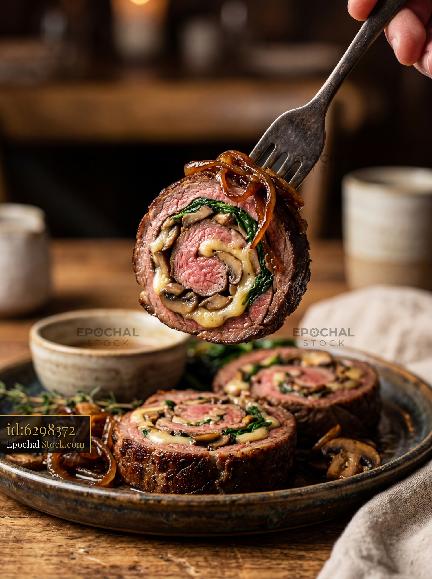 Beef Wellington Slice Lifted on Fork - stock photo