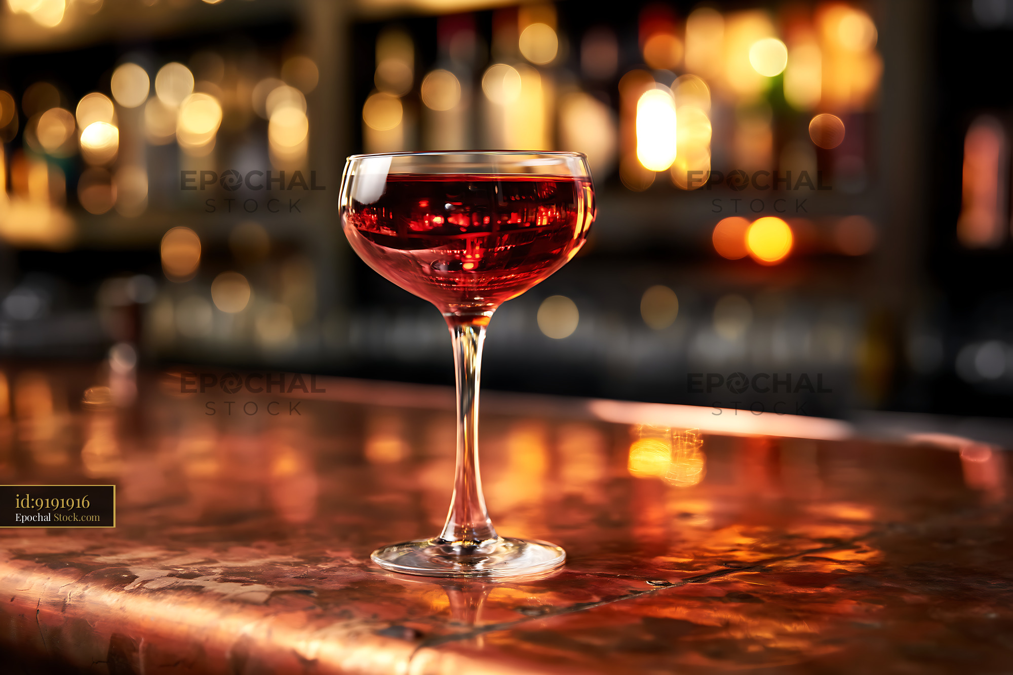 Bushwick Cocktail in Coupe Glass at Bar - stock photo
