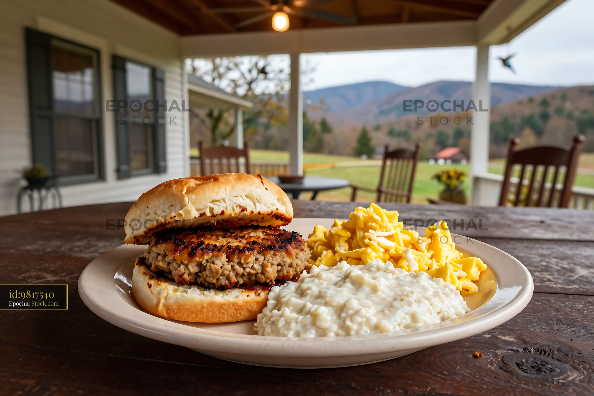 Burger Meal Served on Scenic Mountain Porch - stock photo