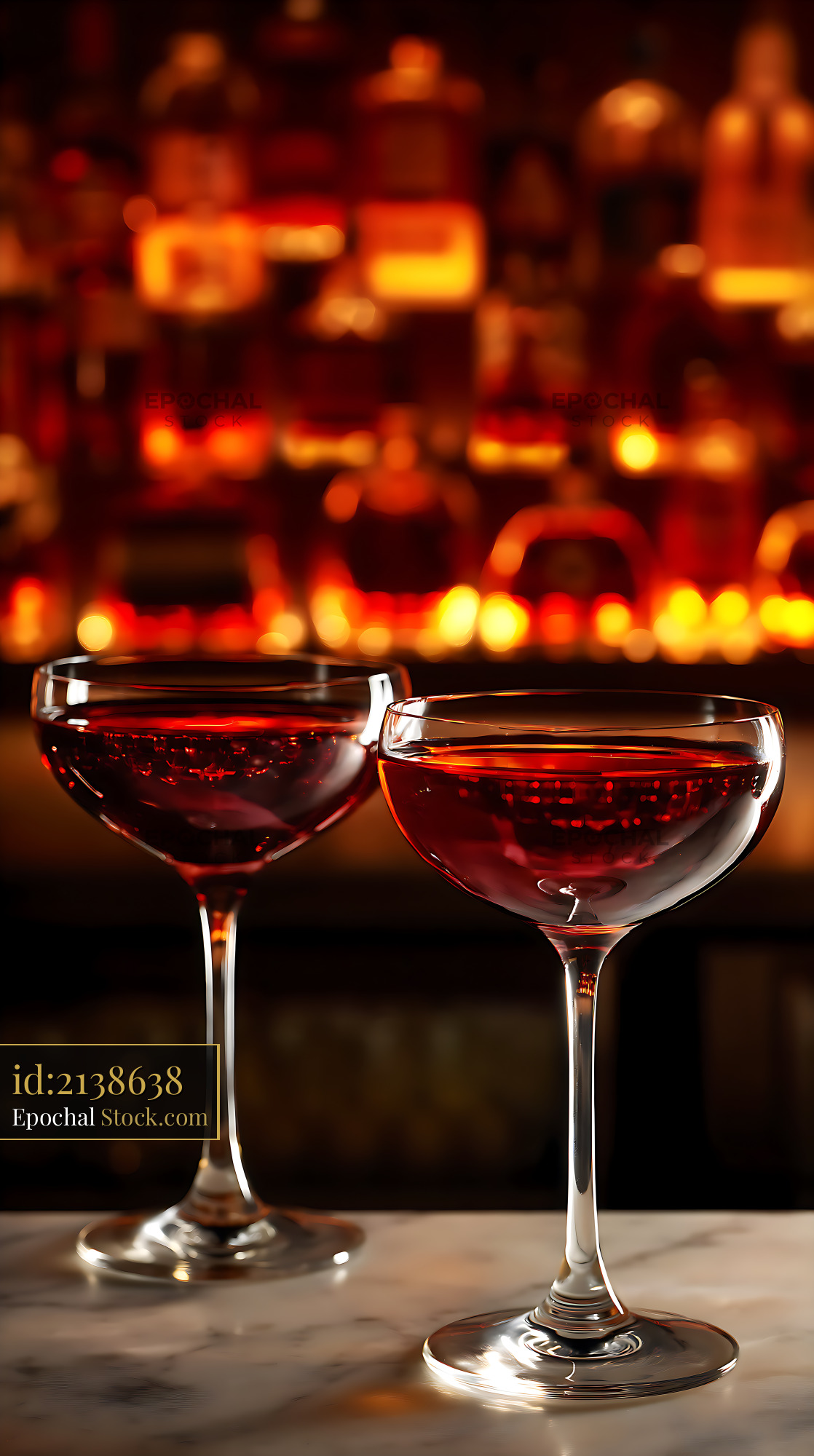 Red Wine Cocktails by Fireplace - stock photo