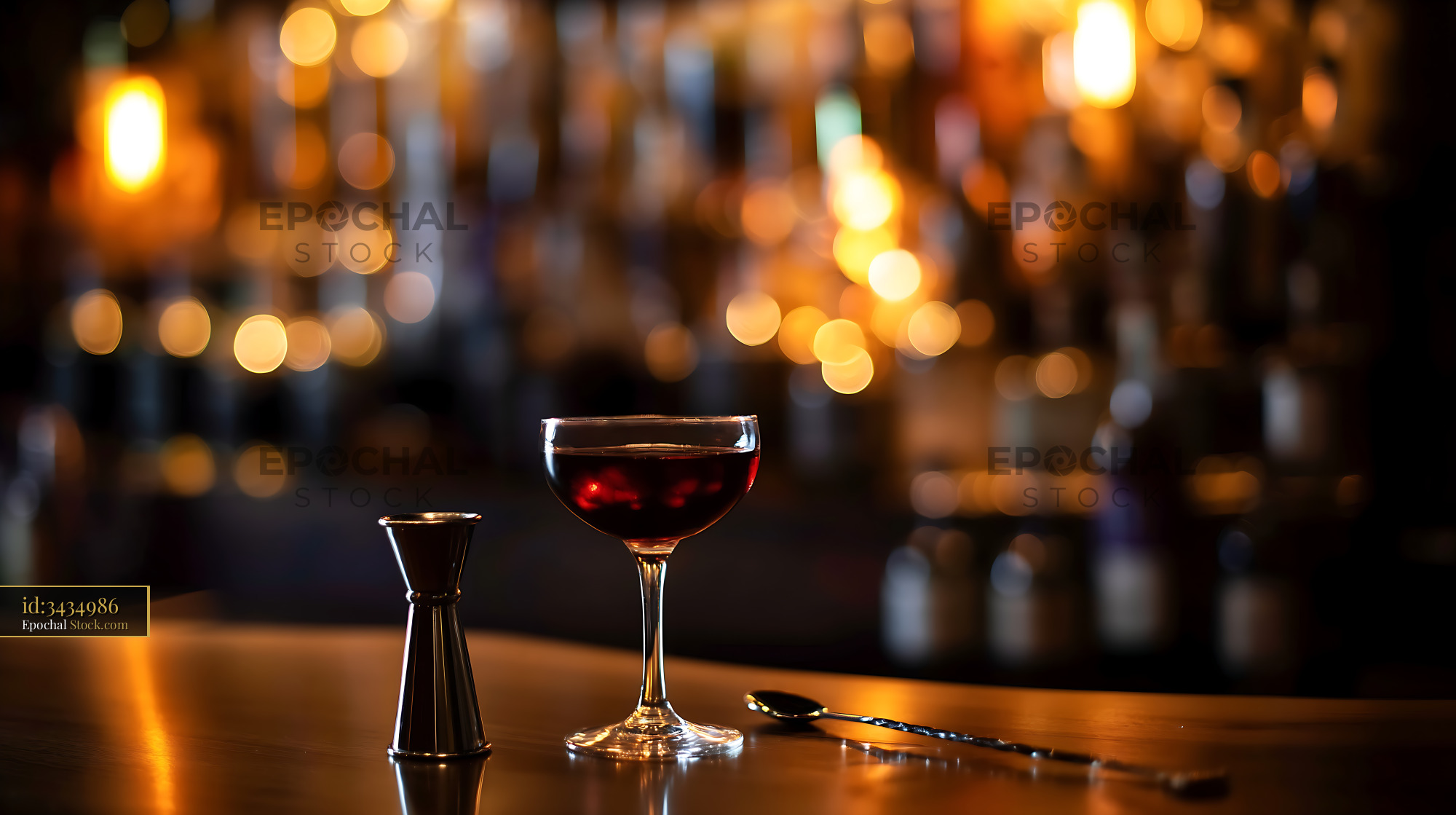 Bushwick Cocktail in Coupe Glass on Bar - stock photo