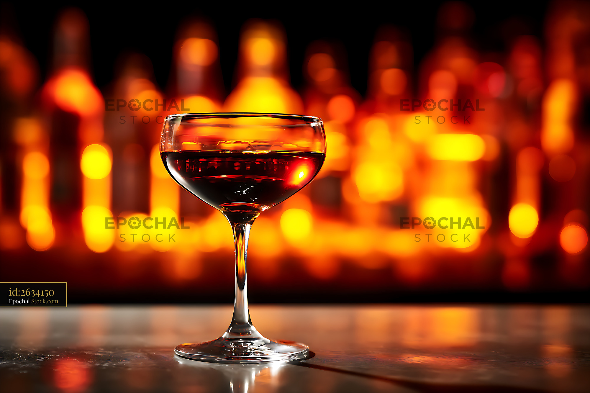 Red Cocktail Glass by Warm Fireplace Light - stock photo