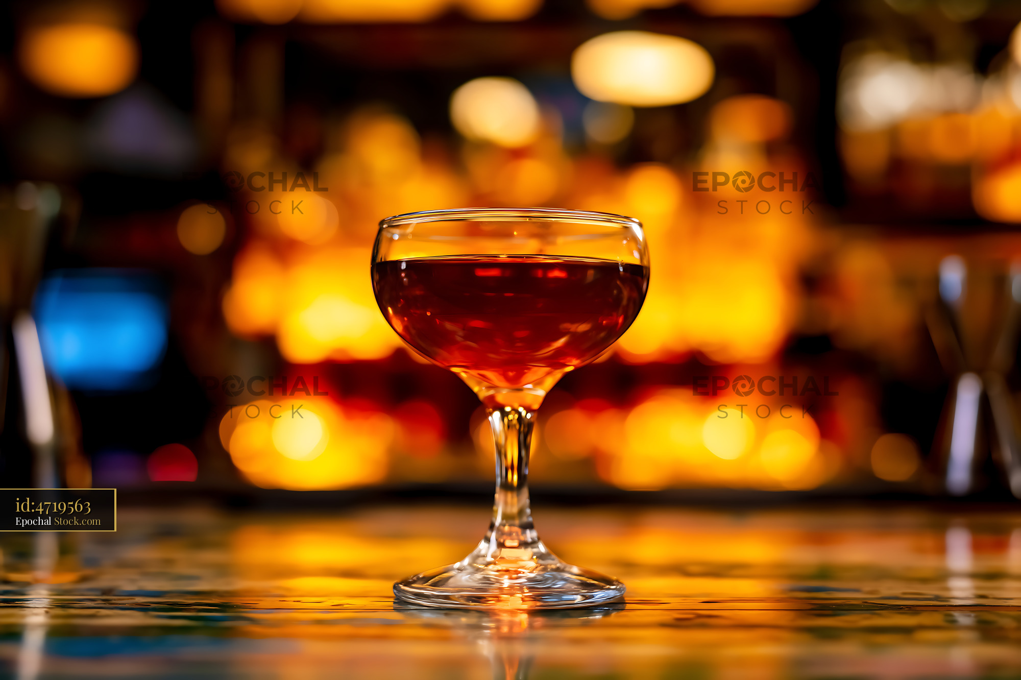 Bushwick Cocktail in Coupe Glass at Bar - stock photo