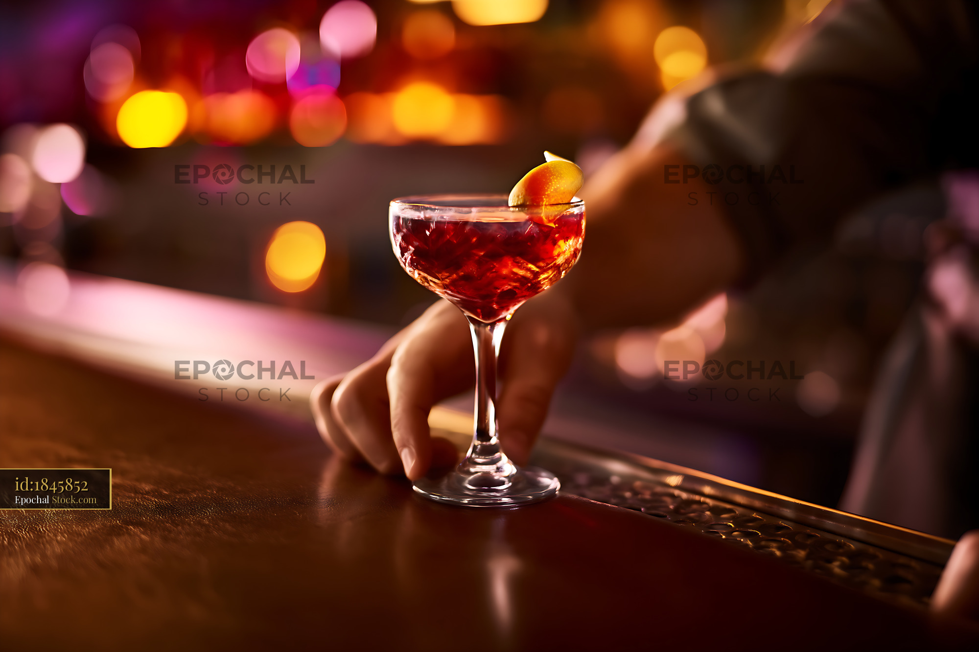 Bushwick Cocktail with Orange Twist at Bar - stock photo