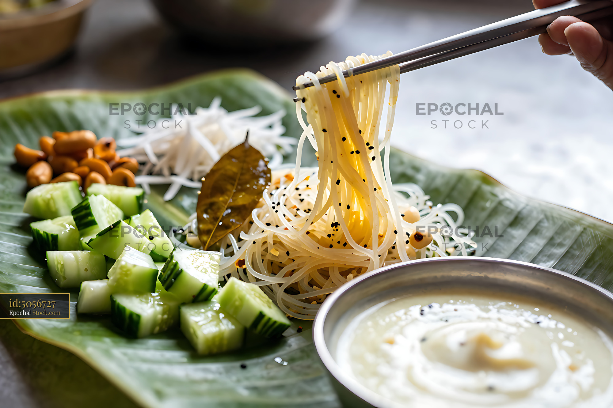 Kakdi Koshimbir with Sesame Noodles on Banana Leaf - stock photo