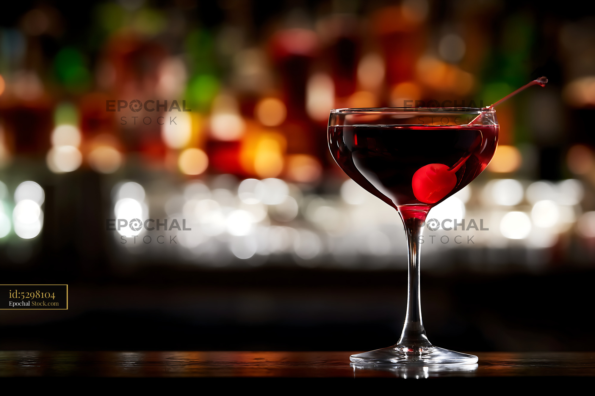 Bushwick Cocktail with Cherry Garnish at Bar - stock photo