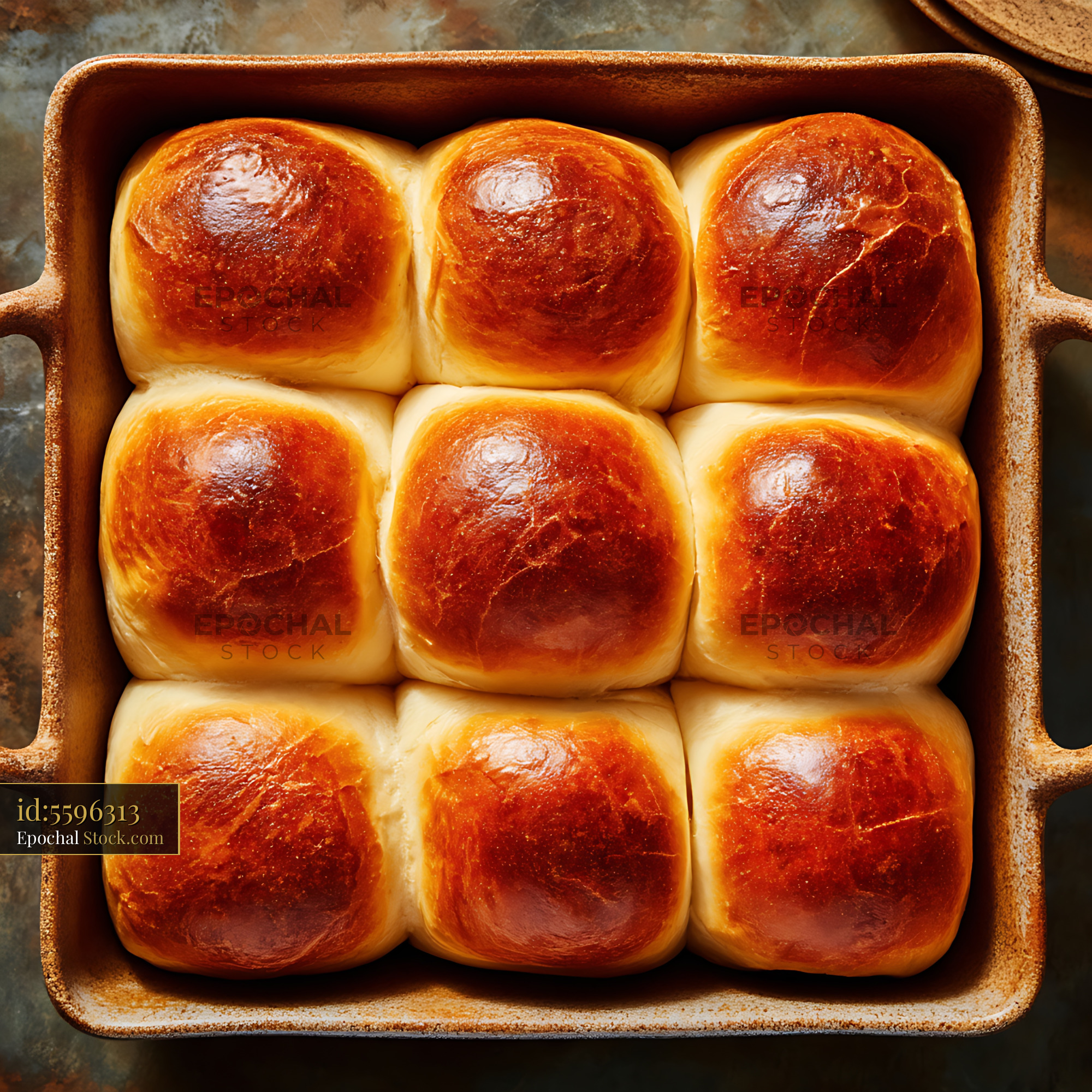 Fresh Baked Dinner Rolls in Rustic Baking Dish - stock photo