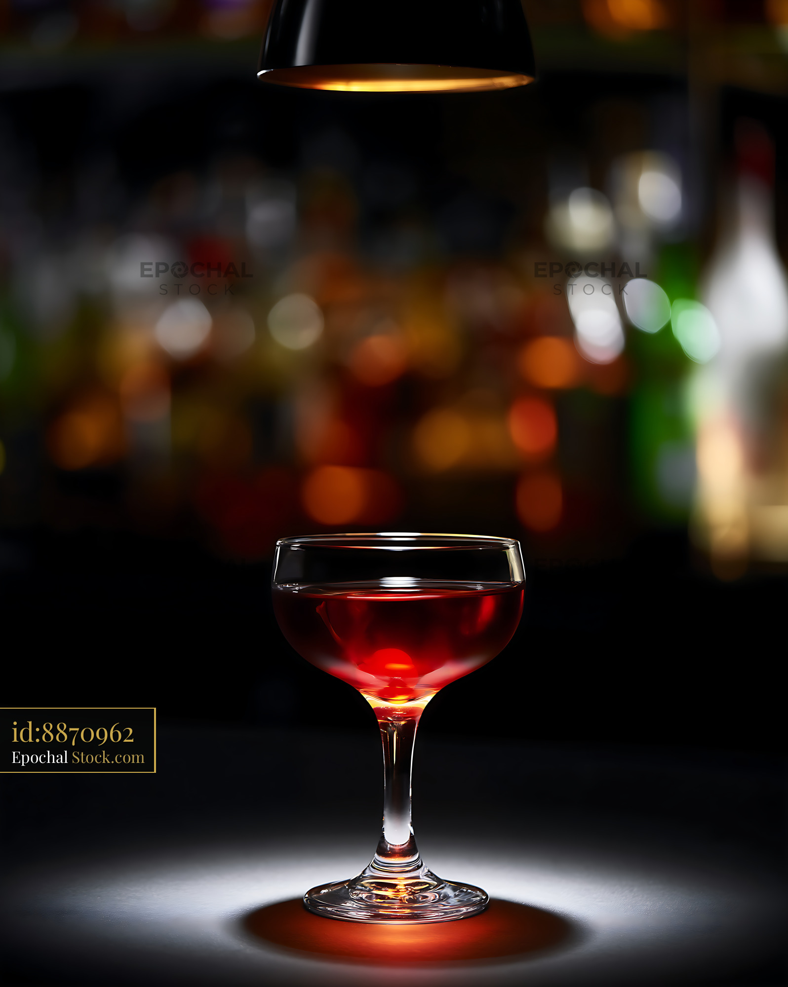 Bushwick Cocktail Under Warm Pendant Light - stock photo