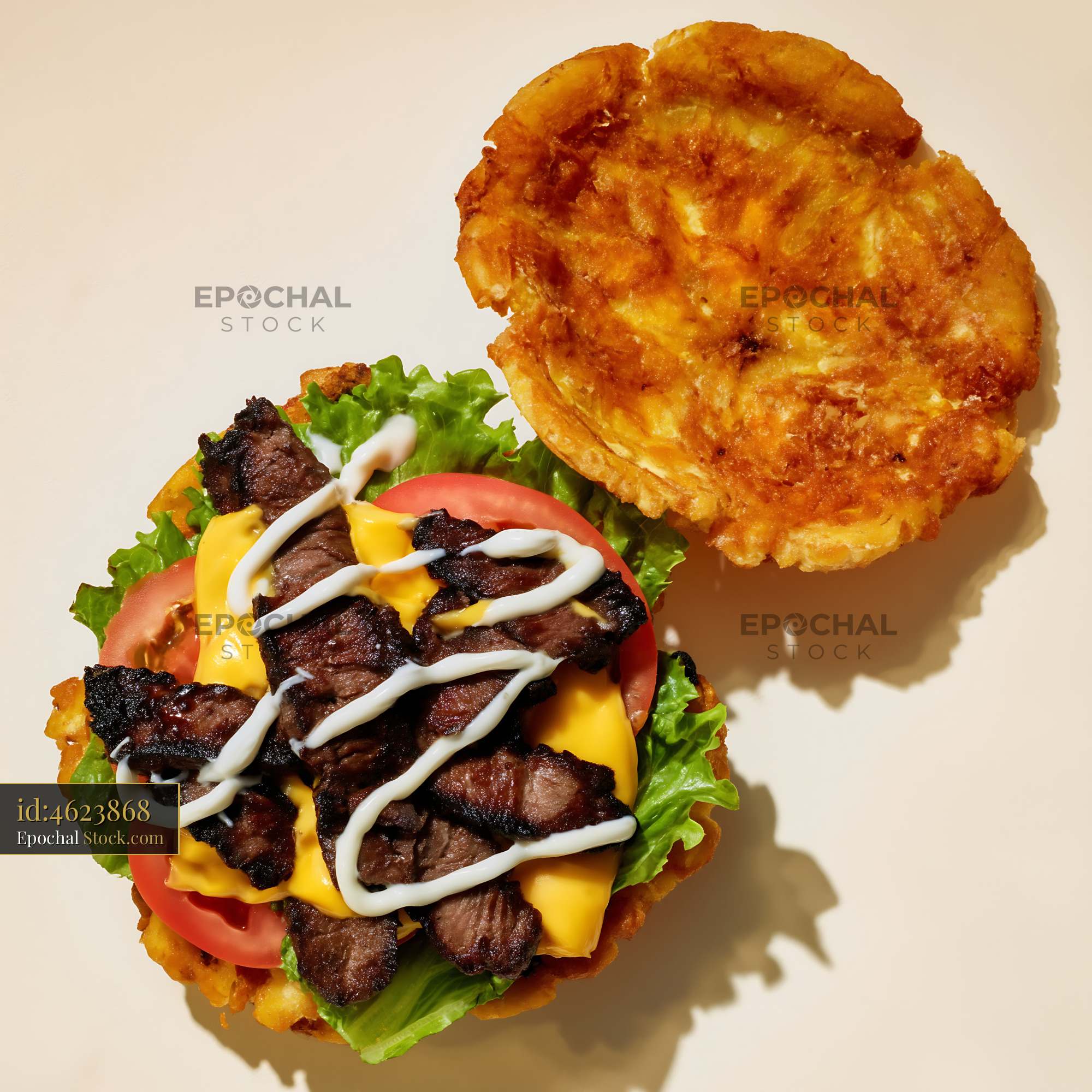 Gourmet Beef Burger with Crispy Hash Brown Bun - stock photo