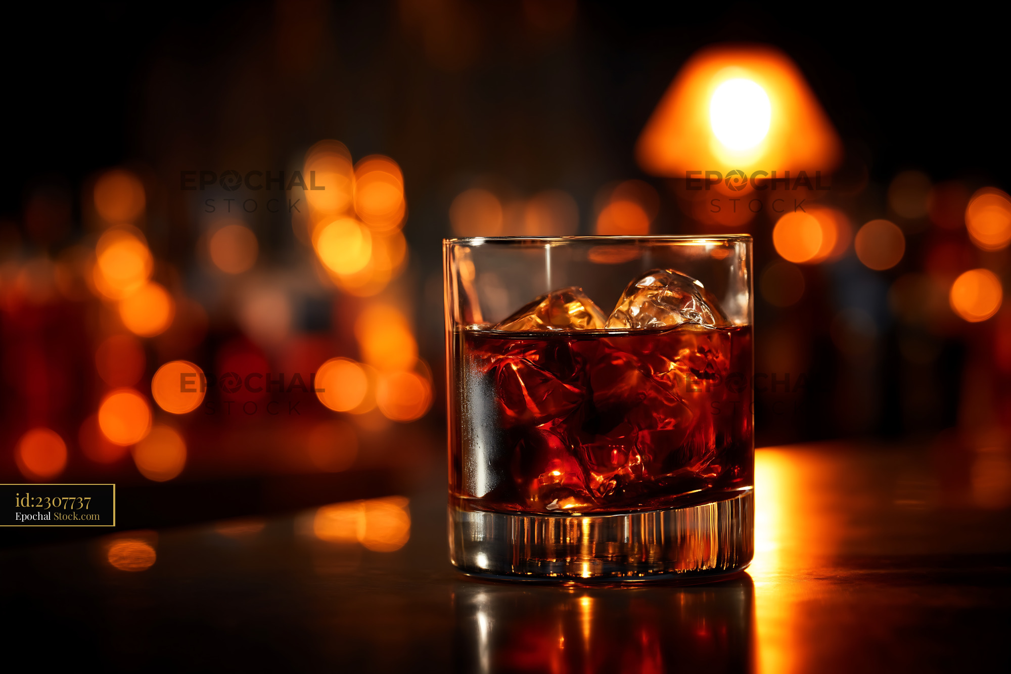 Whiskey on the Rocks Against Warm Bokeh - stock photo