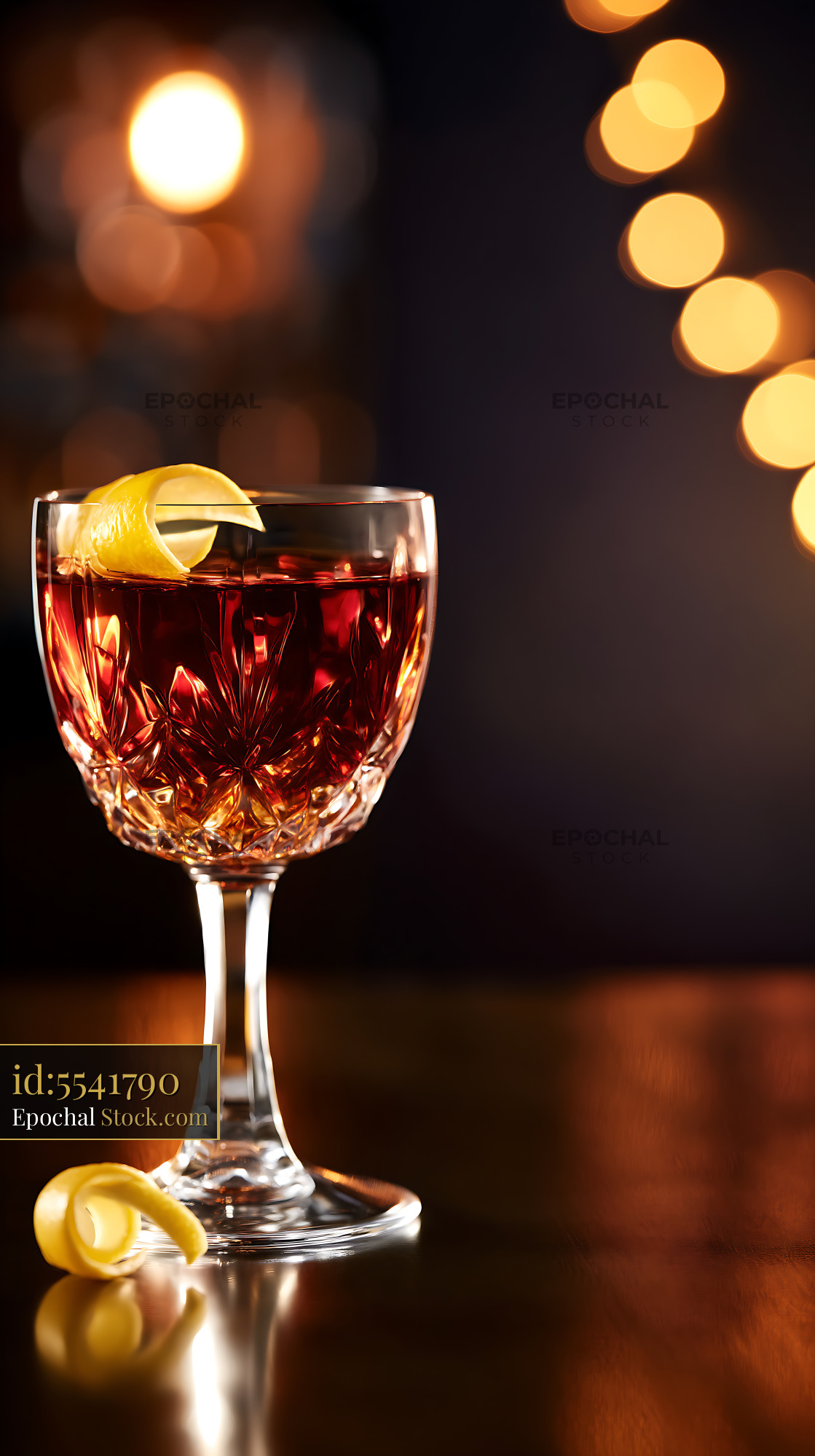 Saratoga Cocktail with Lemon Twist and Bokeh - stock photo