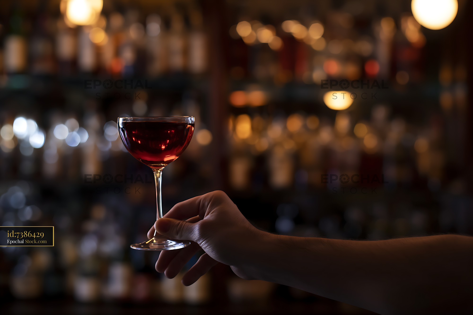 Bushwick Cocktail in Coupe Glass at Bar - stock photo