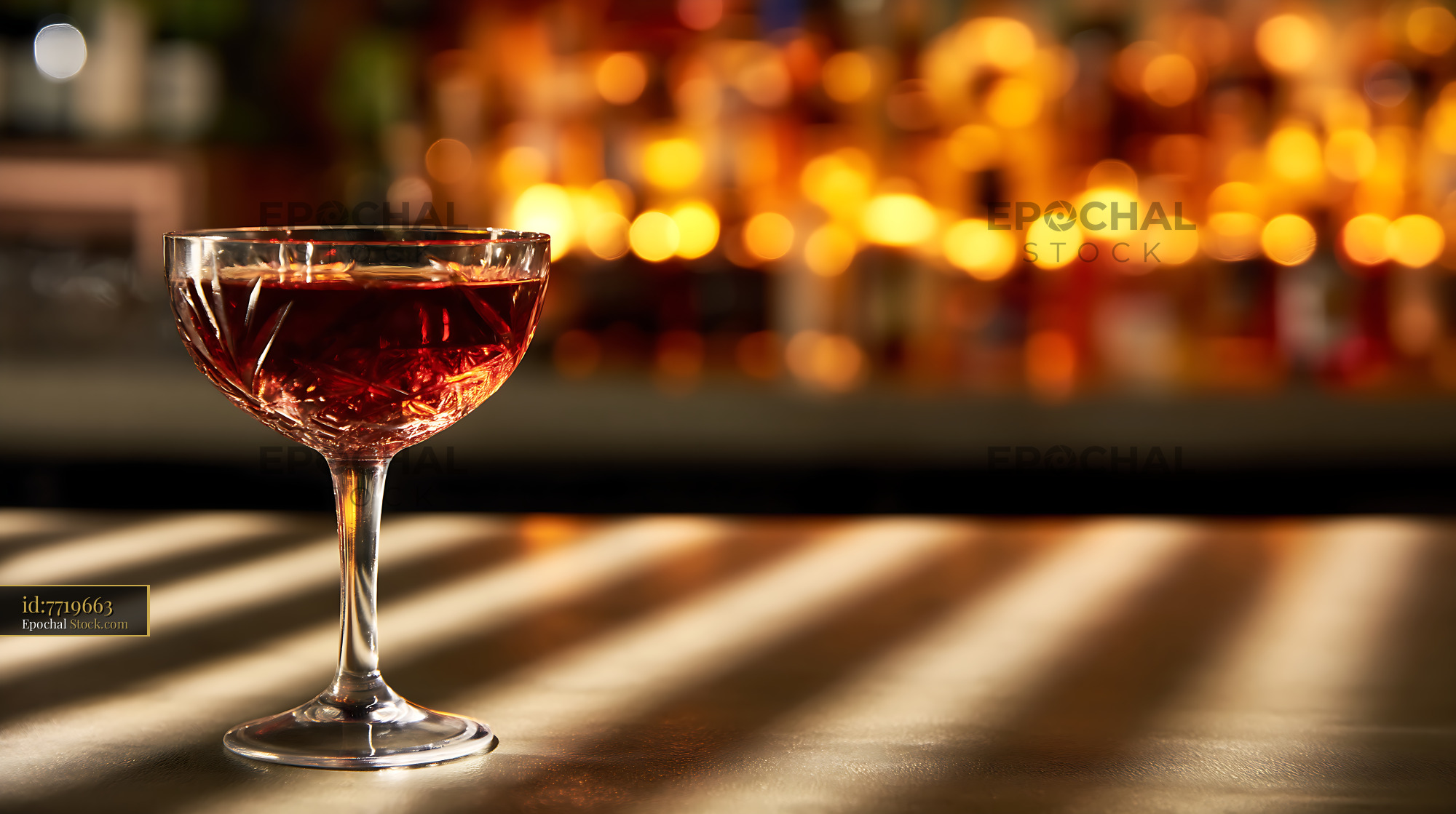 Bushwick Cocktail in Coupe Glass at Bar - stock photo