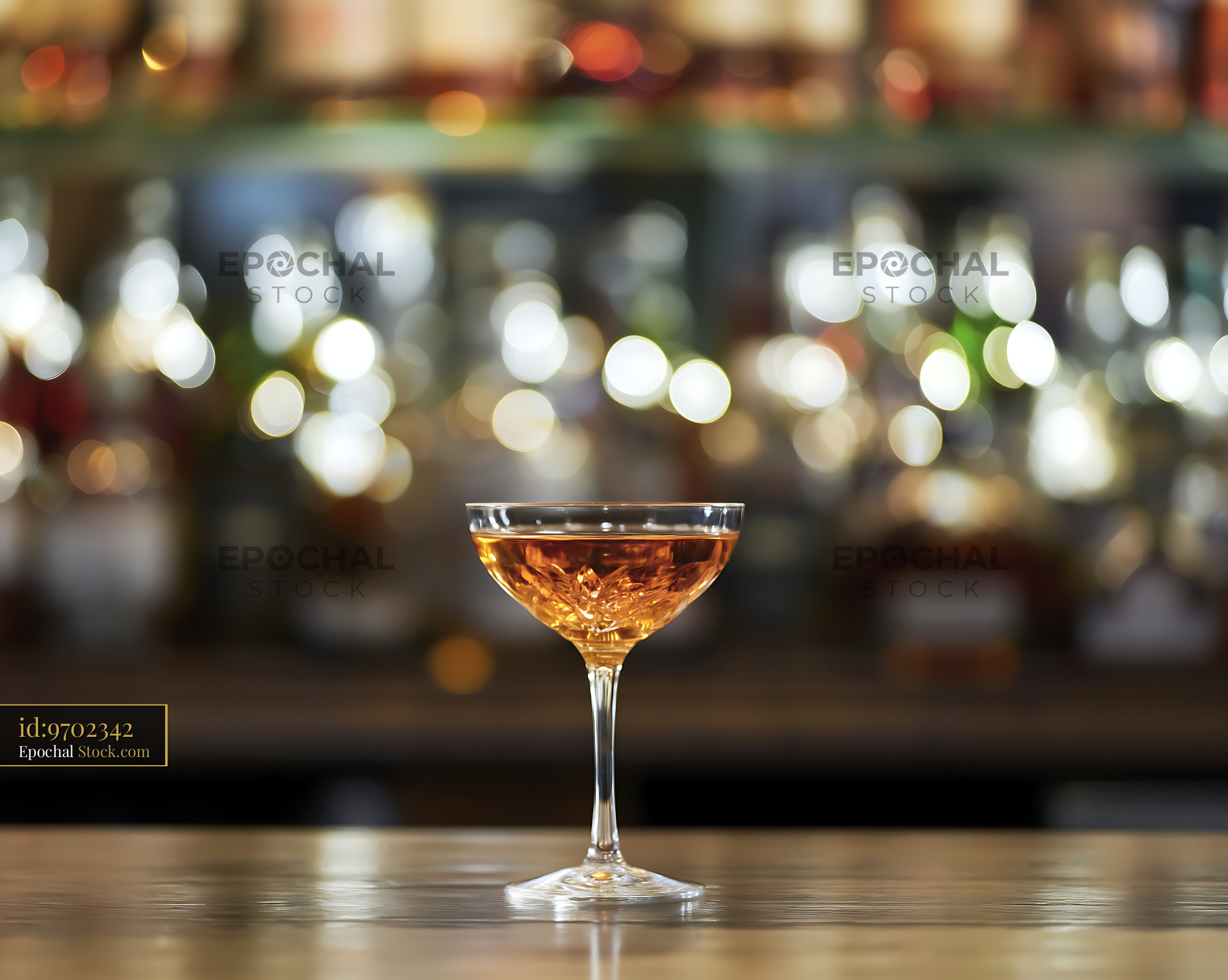 Bushwick Cocktail in Coupe Glass on Bar Counter - stock photo