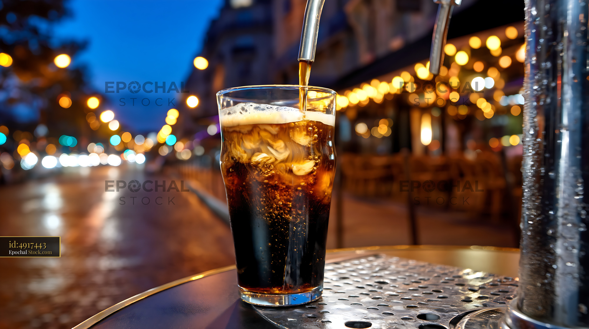 Nitro Caramel Coffee Pouring City Lights - stock photo