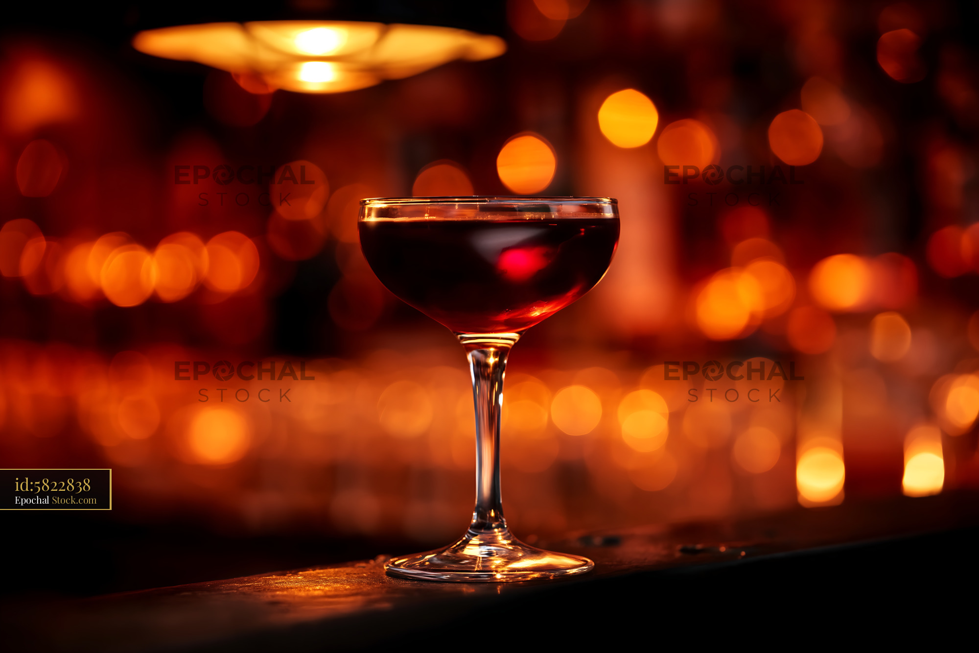 Luxury Red Wine Cocktail in Coupe Glass, Bar - stock photo