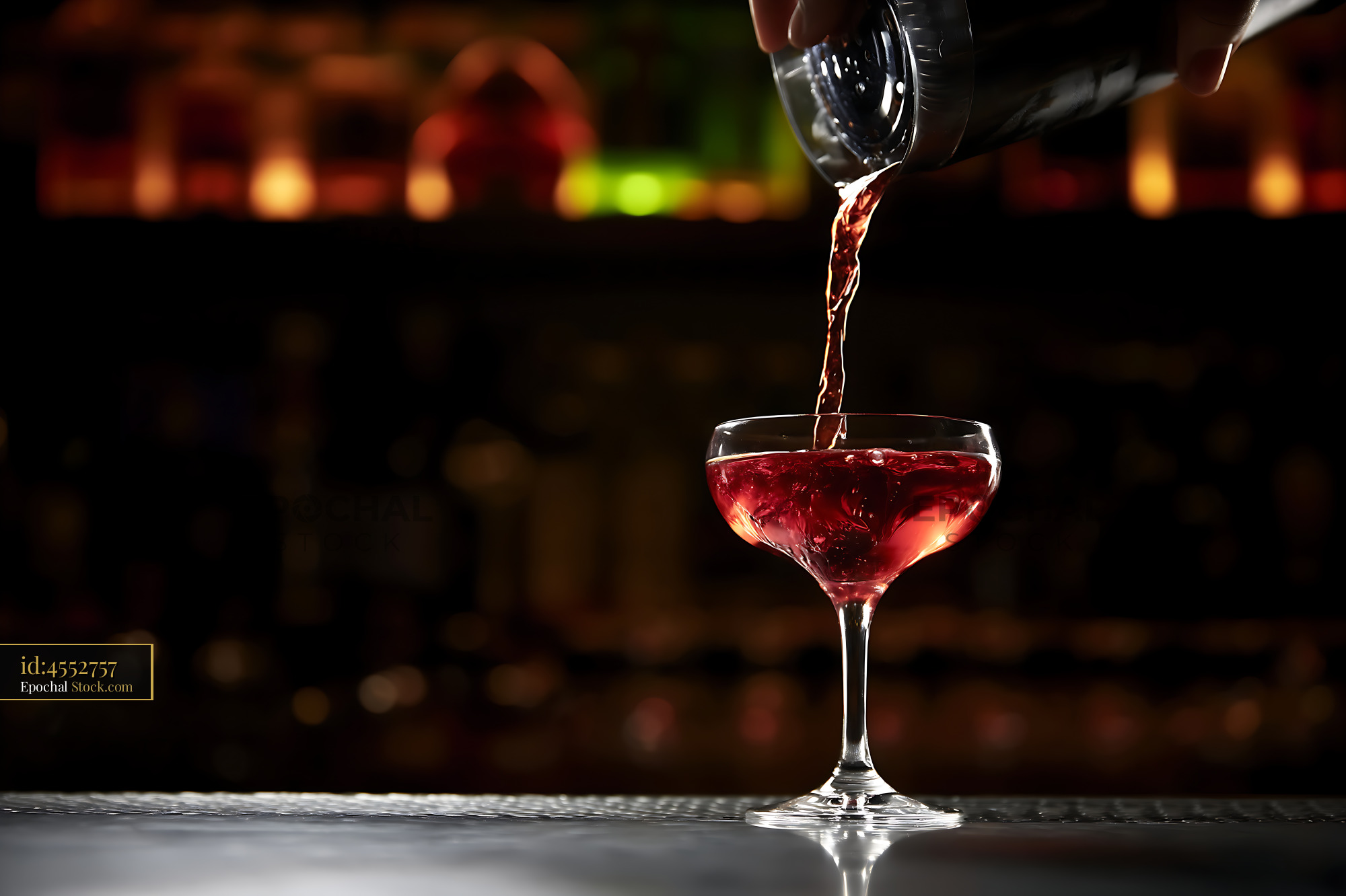 Bushwick Cocktail Pouring Into Coupe Glass - stock photo