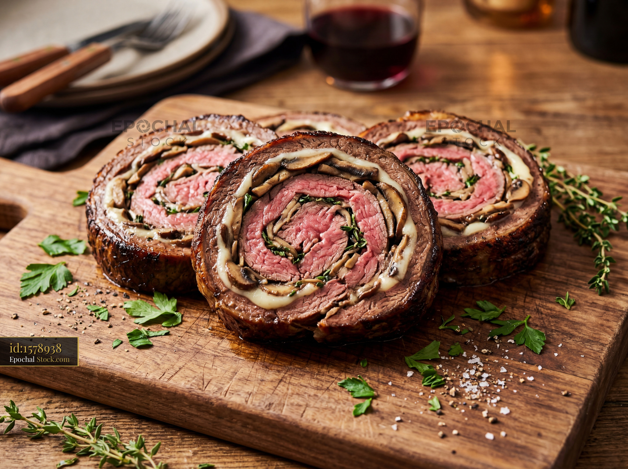 Beef Wellington Slices on Wooden Board - stock photo