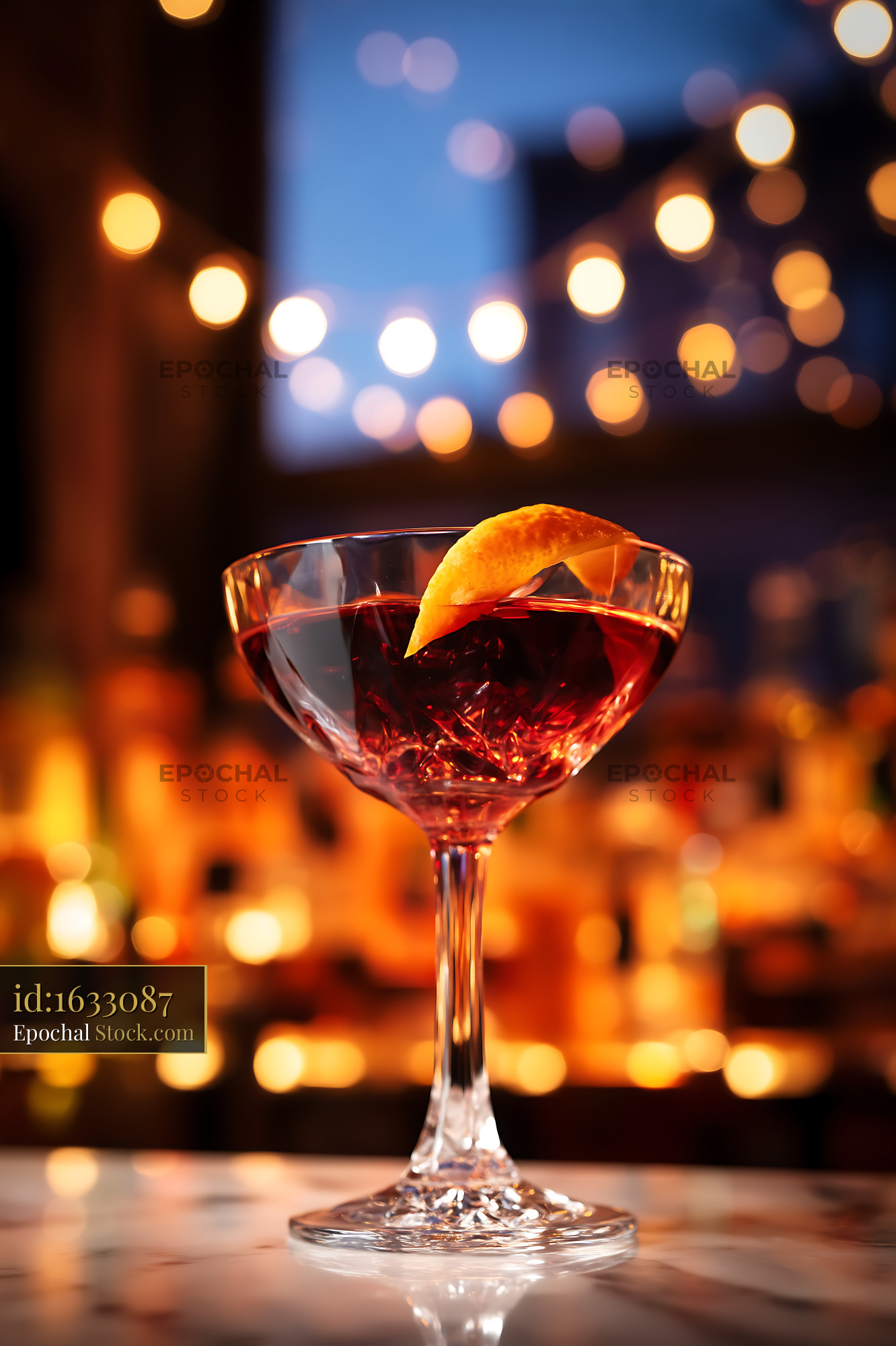 Bushwick Cocktail with Orange Twist at Bar - stock photo