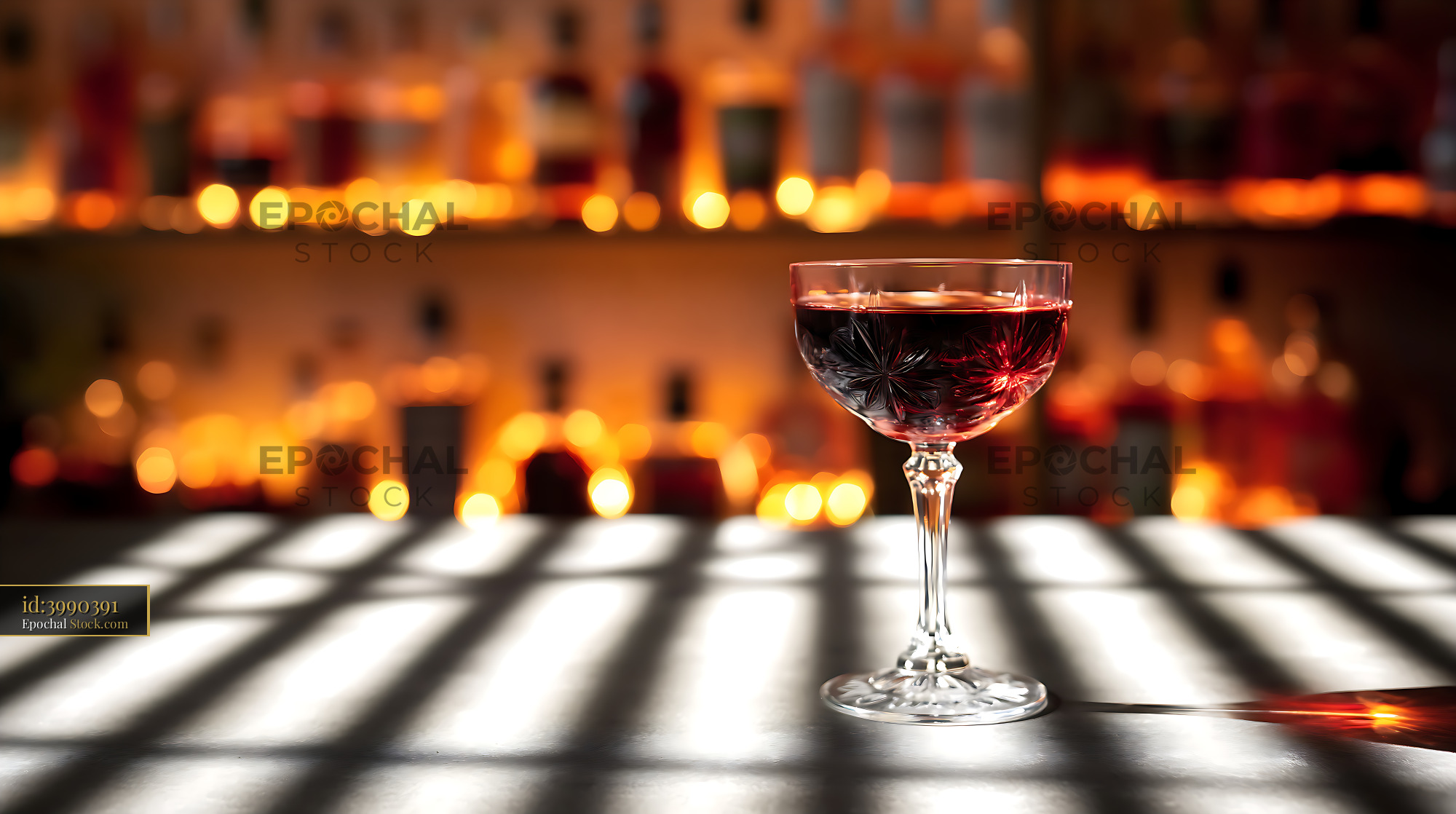 Luxury Cocktail Glass Against Blurred City Night Lights - stock photo
