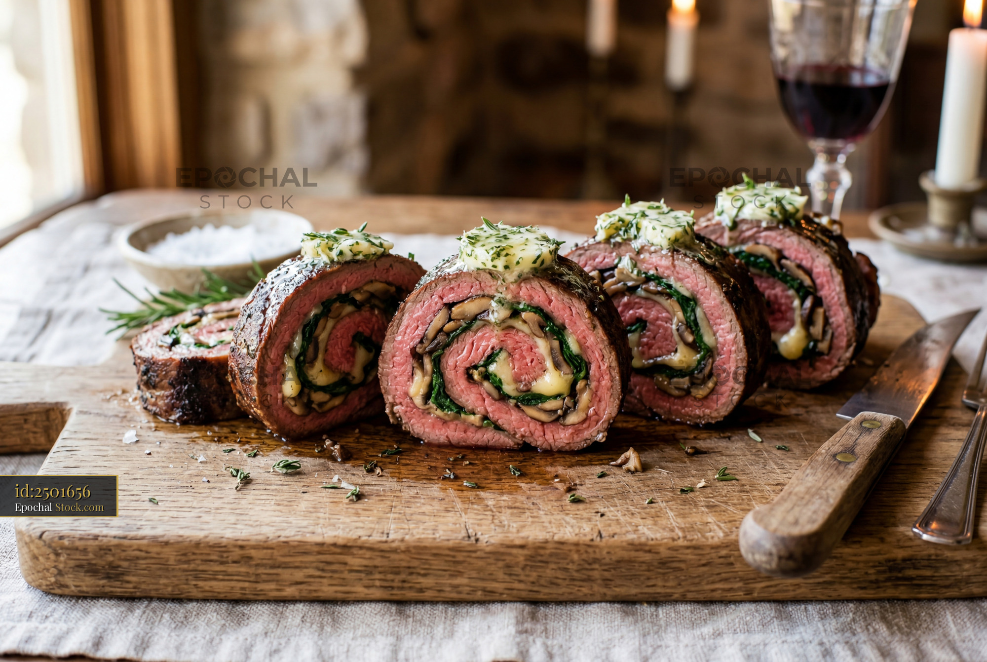 Sliced Beef Roulade with Herb Butter Topping - stock photo