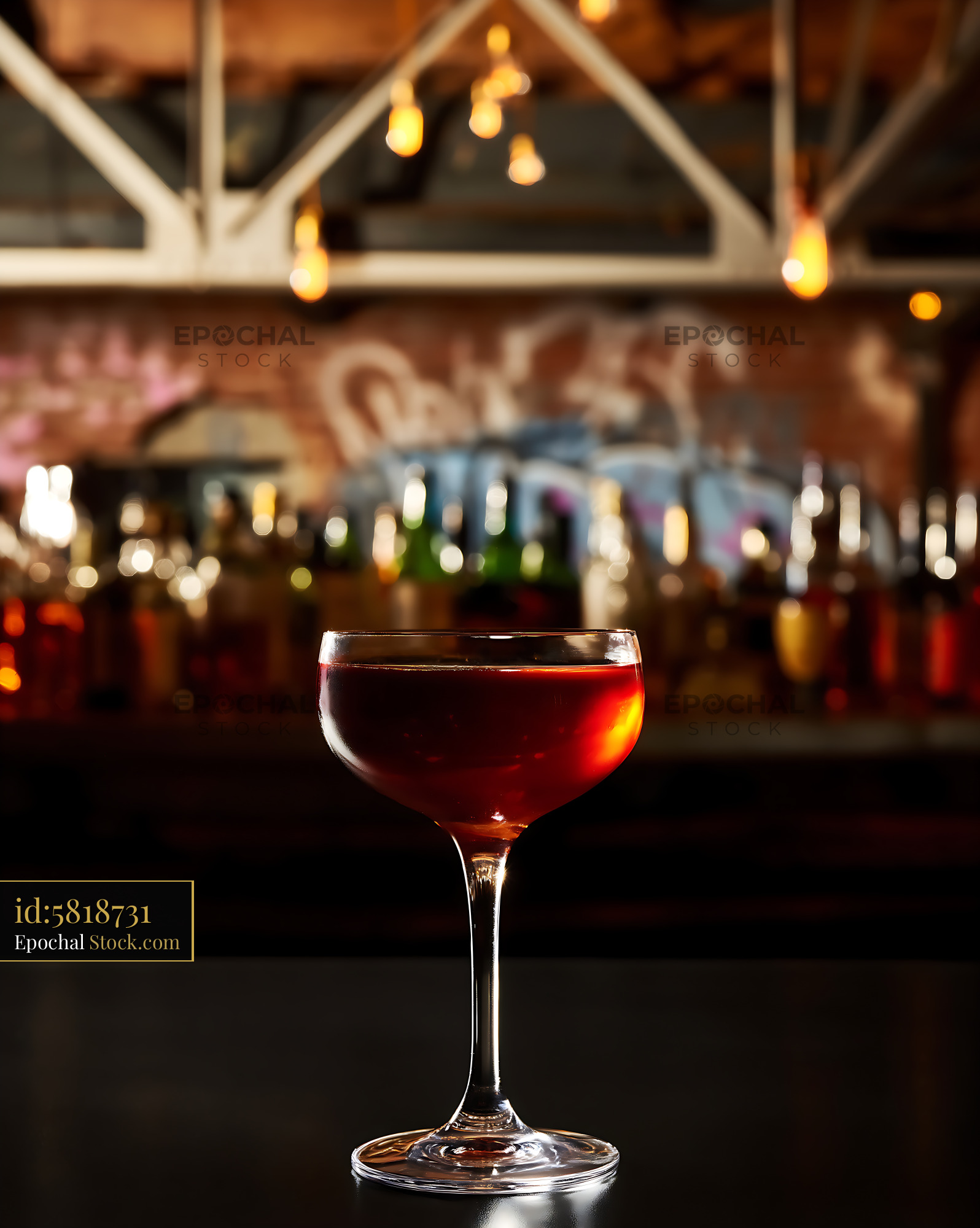 Bushwick Cocktail in Coupe Glass at Upscale Bar - stock photo