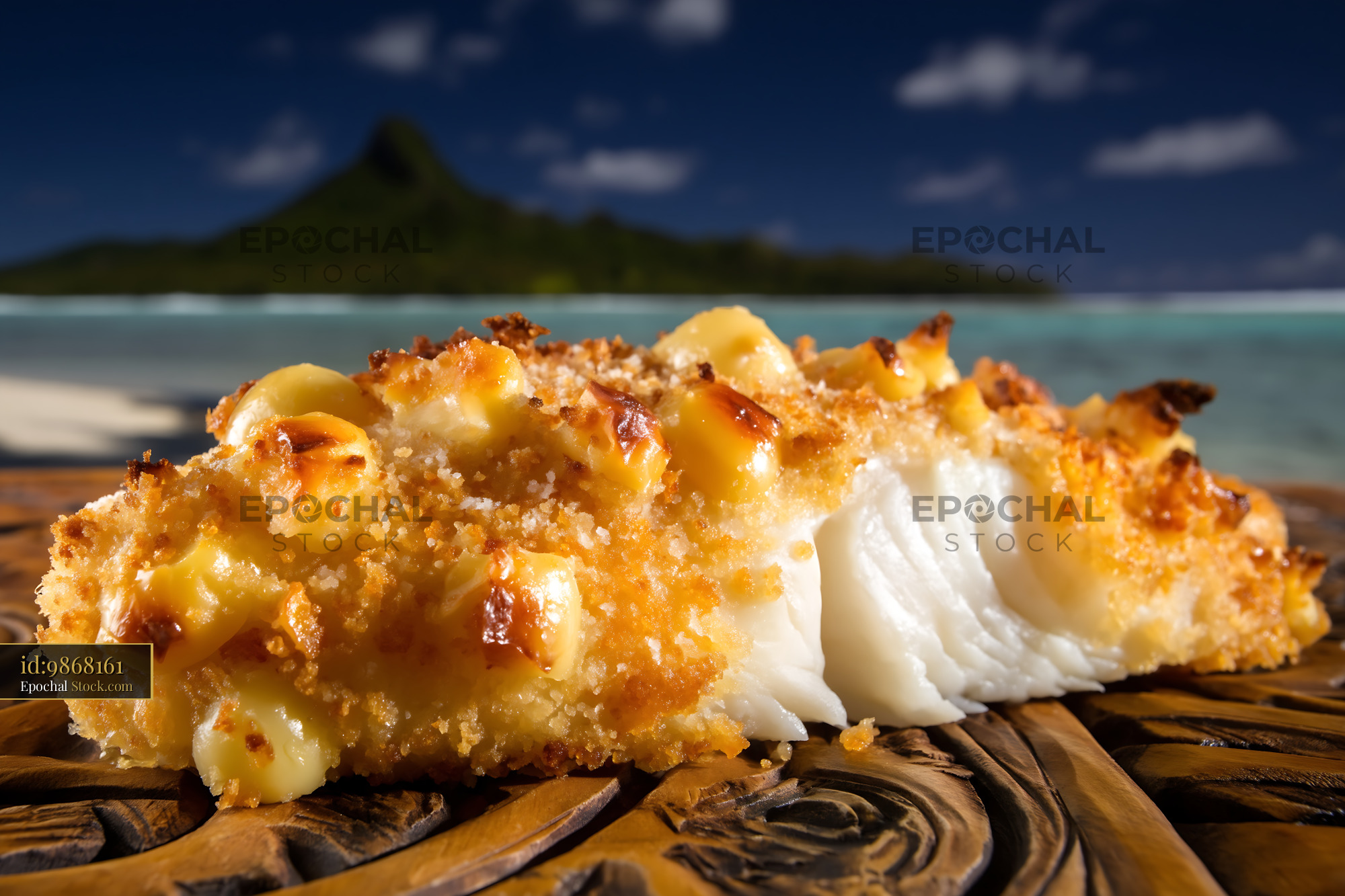 Coconut Crusted Fish Filet in Tropical Beach Setting - stock photo