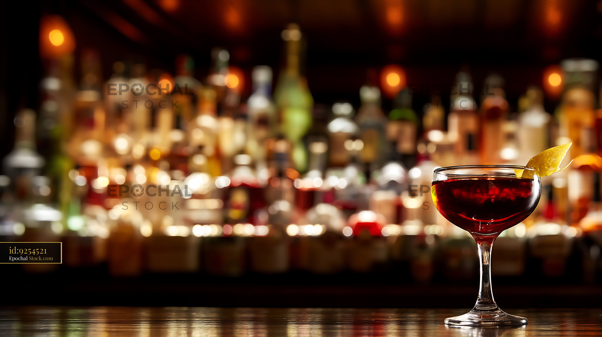 Bushwick Cocktail with Lemon Twist at Bar - stock photo