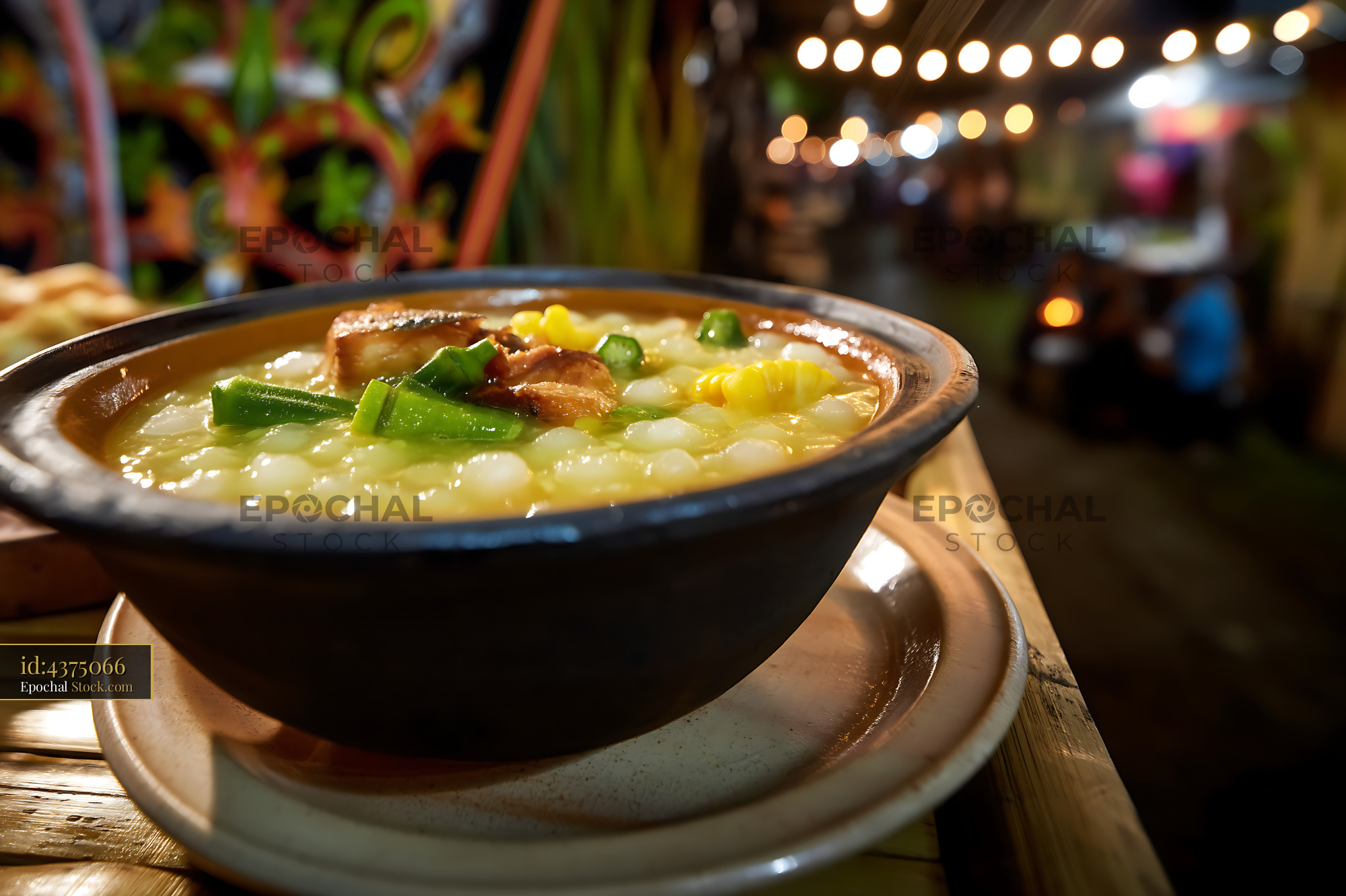 Kapurung Soup Served at Warm Night Market Stall - stock photo