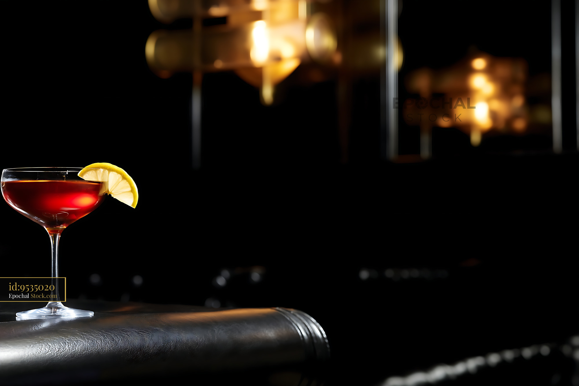 Saratoga Cocktail with Lemon at Bar - stock photo